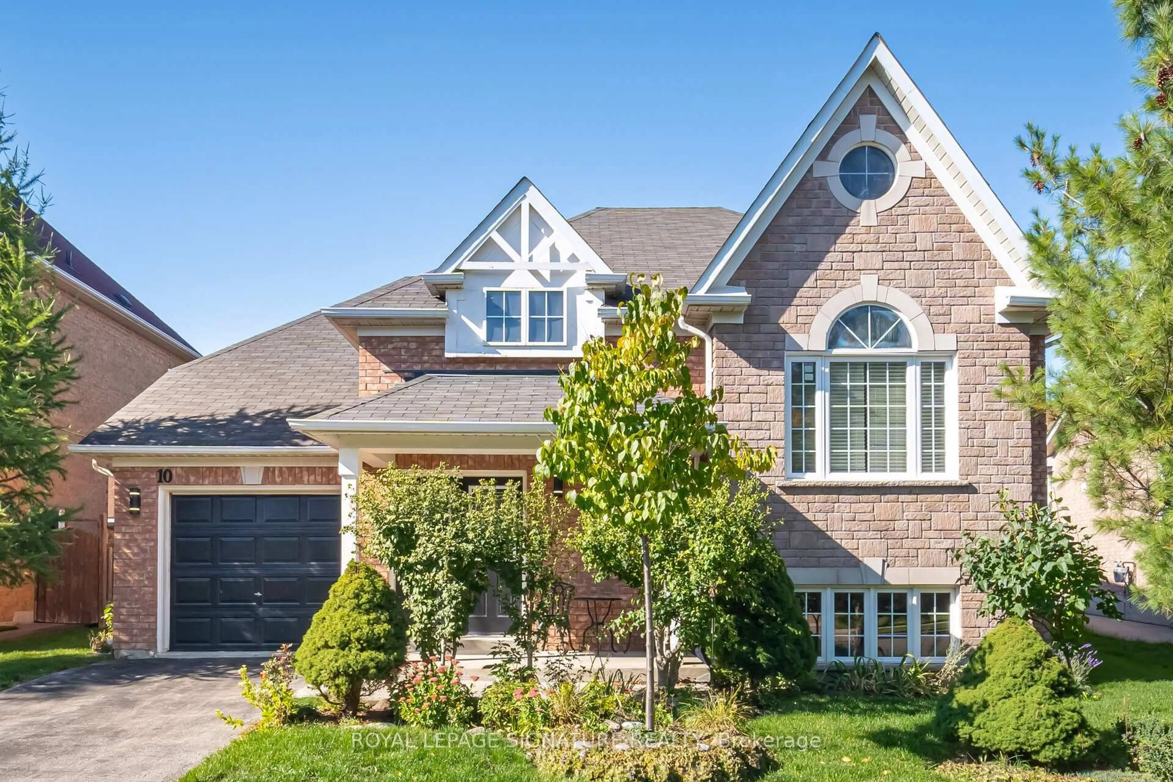 Home with brick exterior material, street for 10 Banks Dr, Brampton Ontario L6P 1C7
