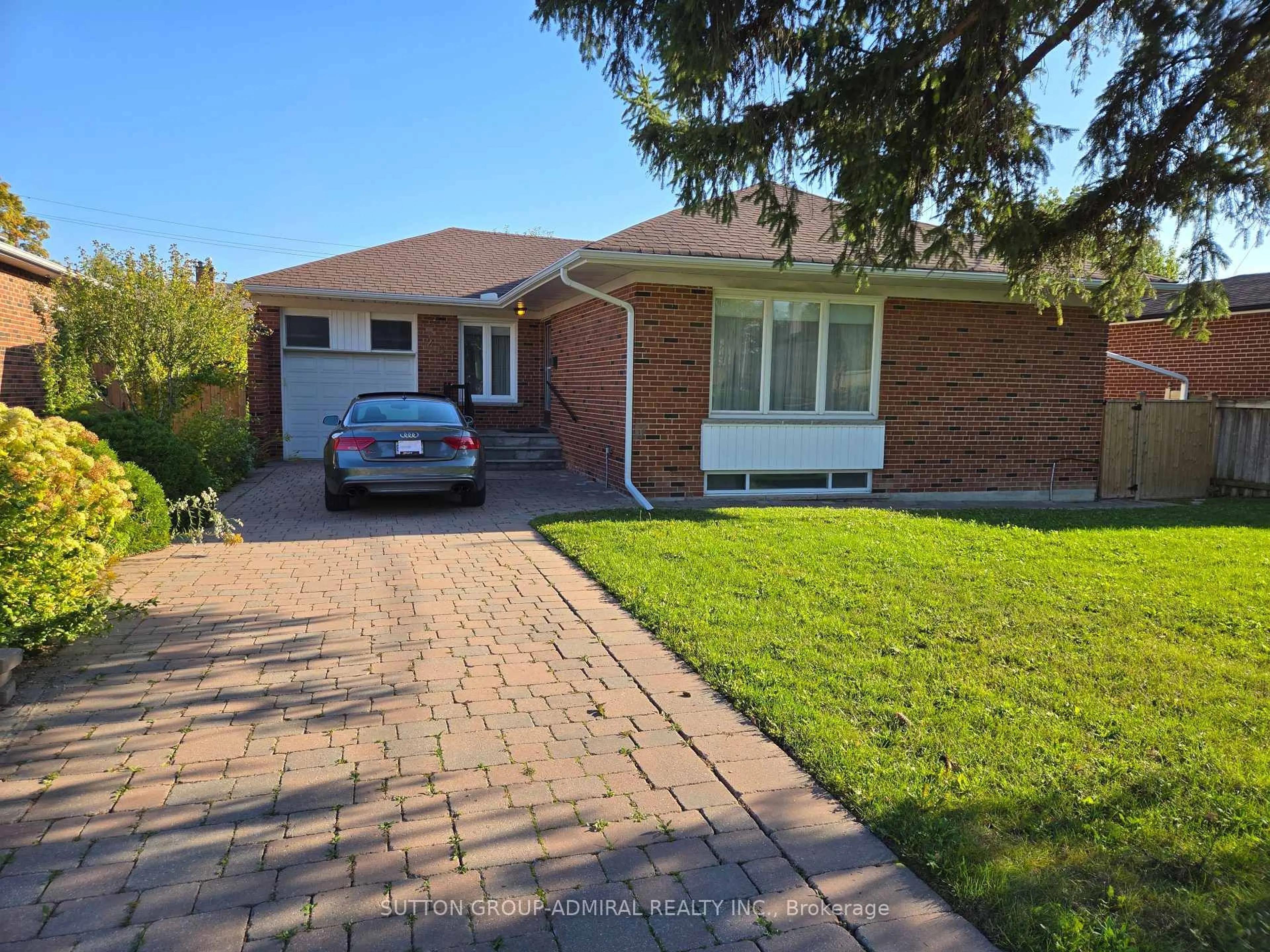 Home with brick exterior material, street for 261 Epsom Downs Dr, Toronto Ontario M3M 1T3