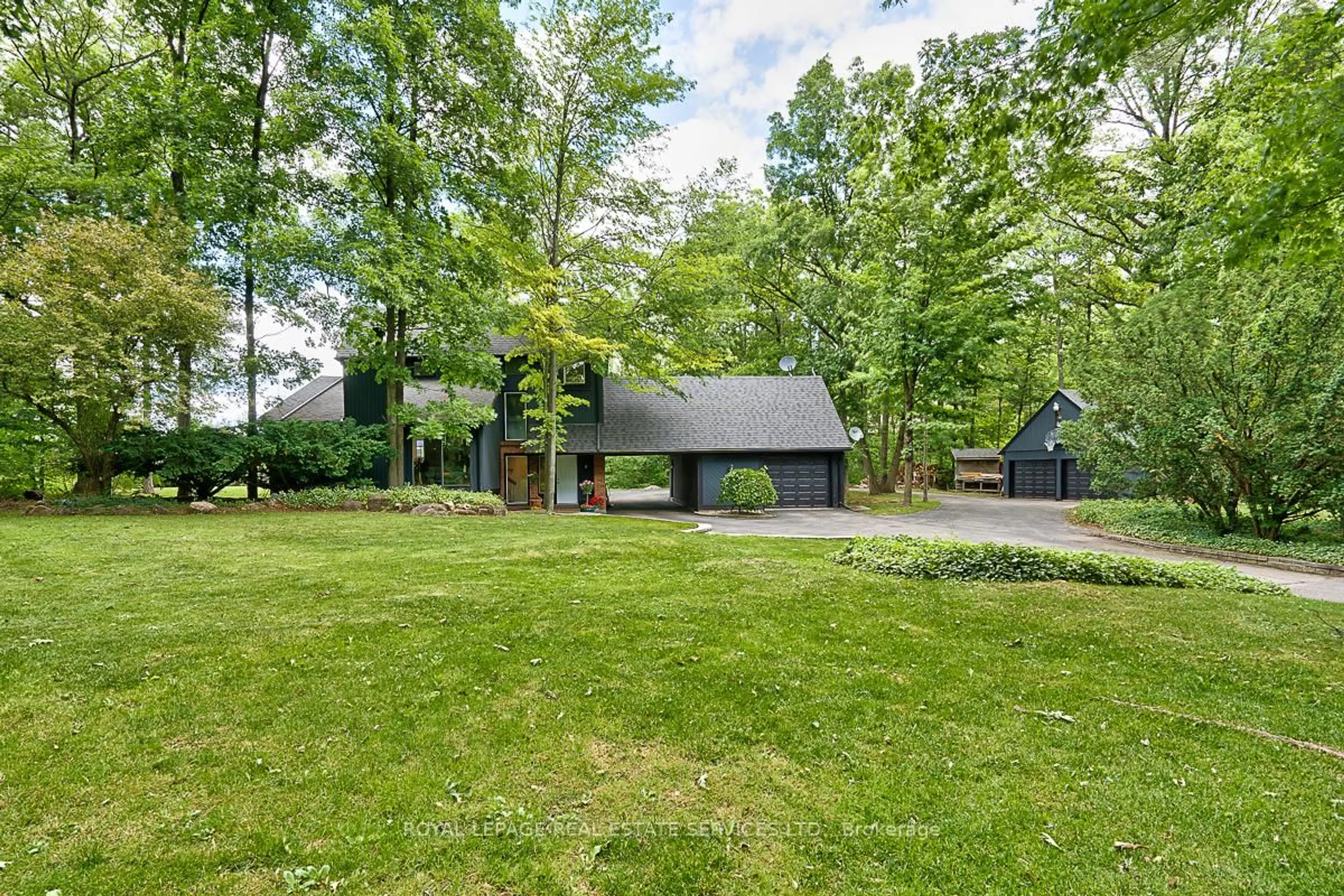 A pic from outside/outdoor area/front of a property/back of a property/a pic from drone, unknown for 5465 No. 1 Sdrd, Milton Ontario L9E 0P6
