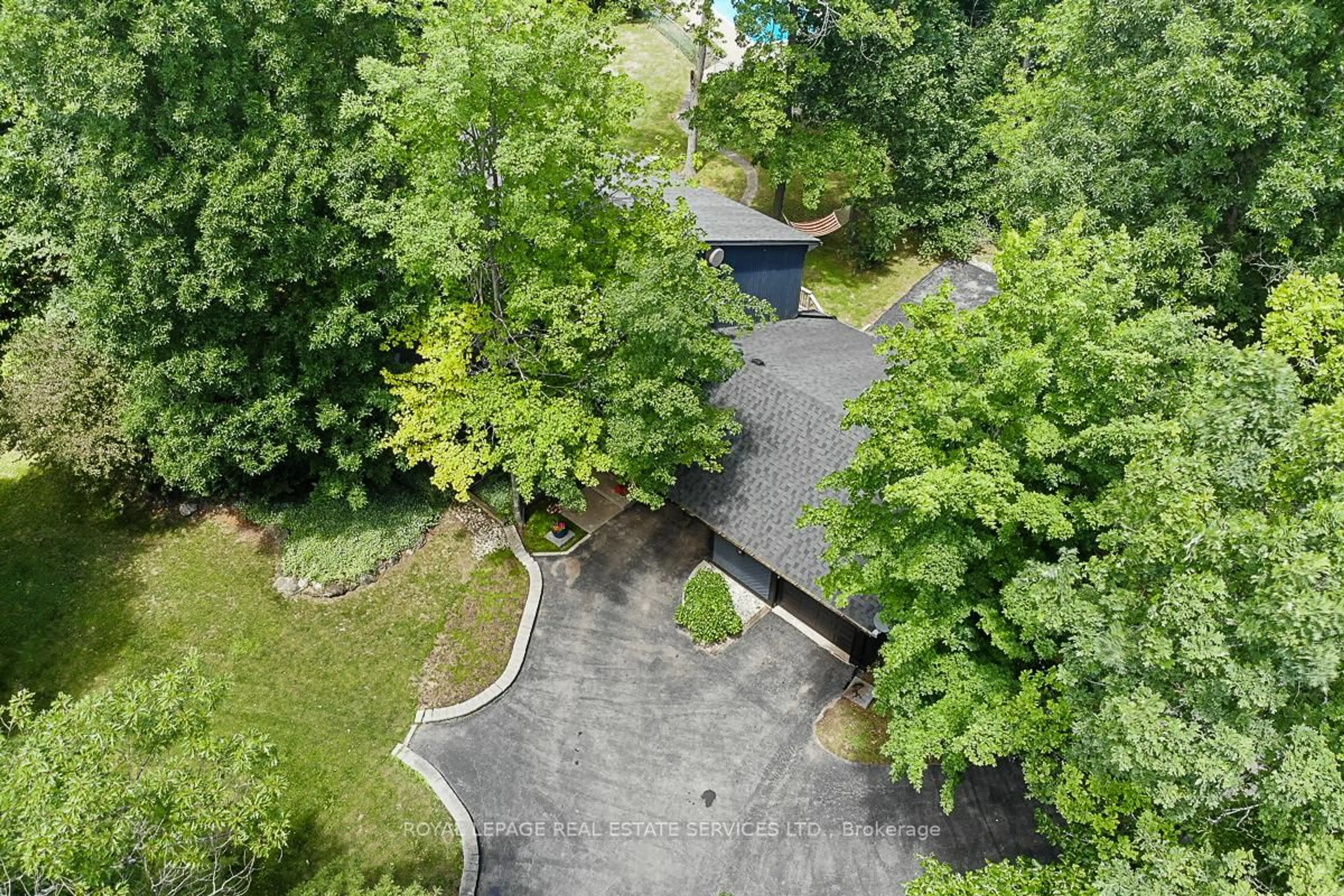 A pic from outside/outdoor area/front of a property/back of a property/a pic from drone, forest/trees view for 5465 No. 1 Sdrd, Milton Ontario L9E 0P6