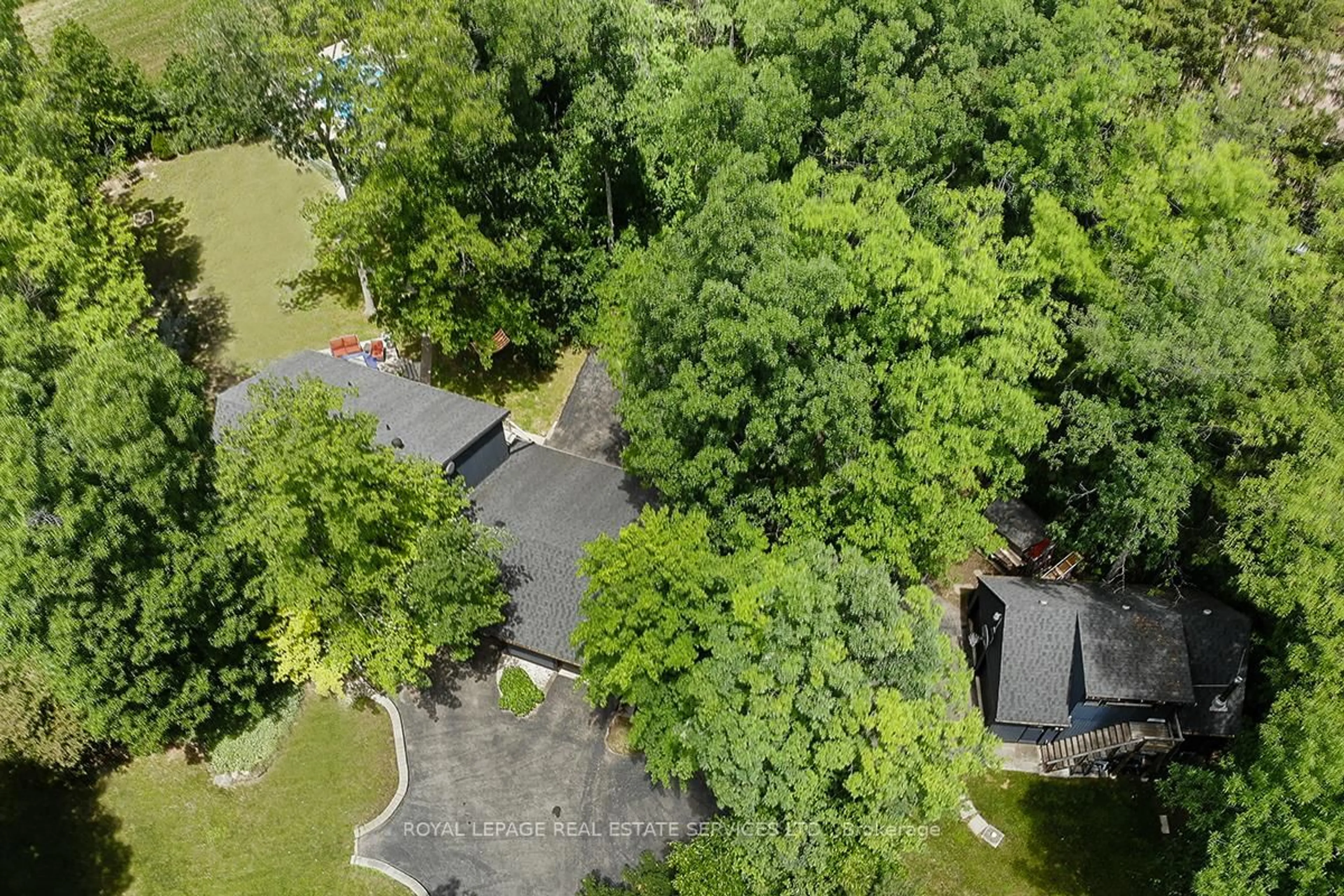 A pic from outside/outdoor area/front of a property/back of a property/a pic from drone, forest/trees view for 5465 No. 1 Sdrd, Milton Ontario L9E 0P6