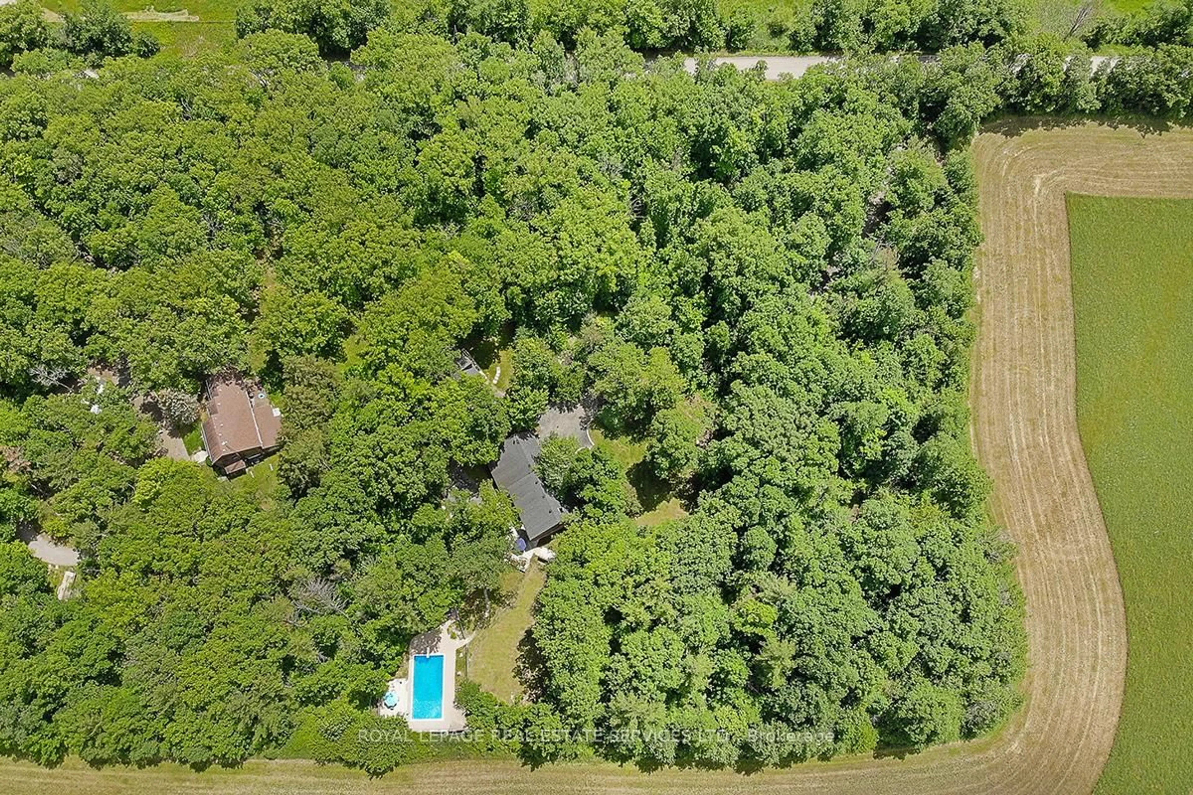 A pic from outside/outdoor area/front of a property/back of a property/a pic from drone, forest/trees view for 5465 No. 1 Sdrd, Milton Ontario L9E 0P6