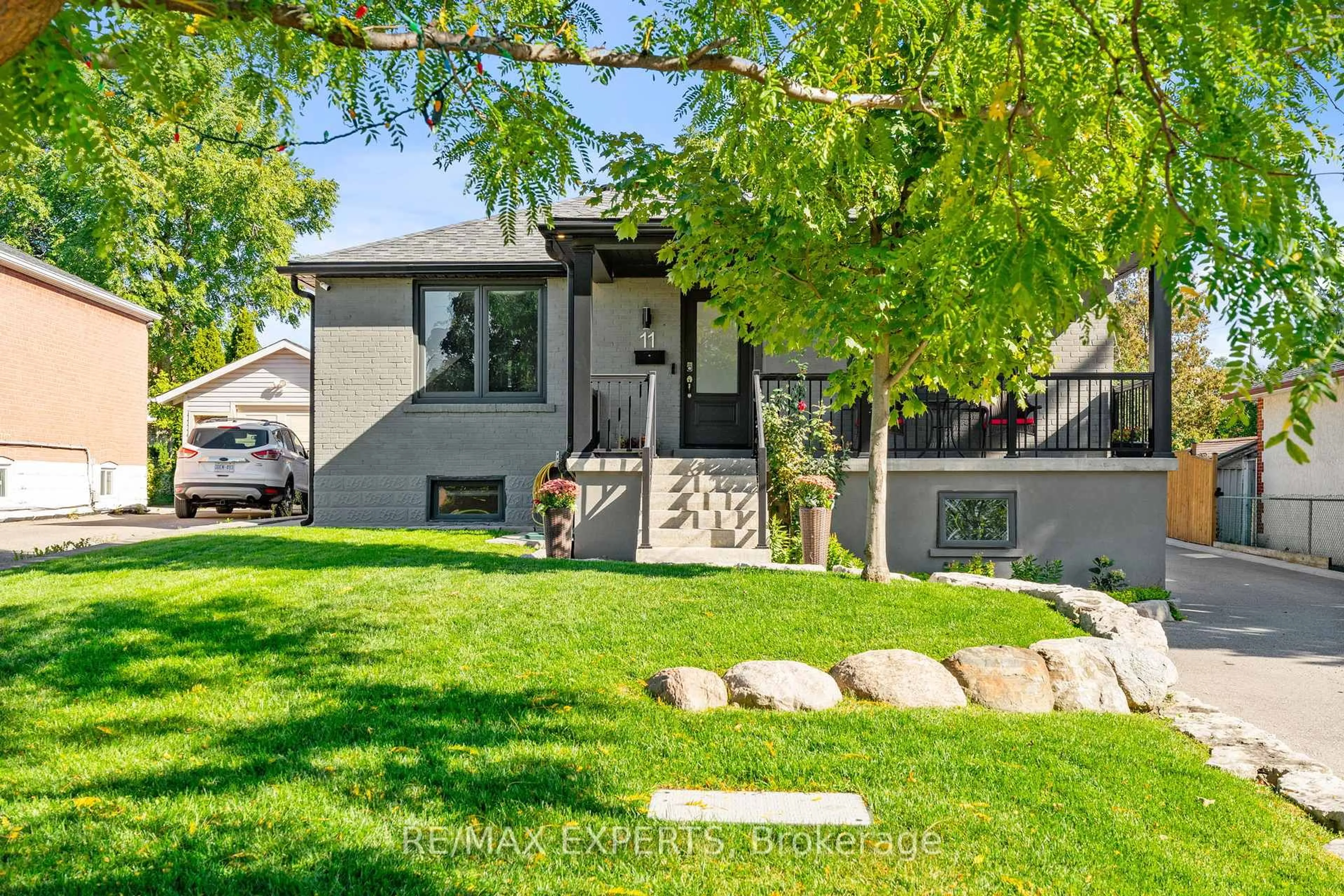 Home with vinyl exterior material, street for 11 Smallwood Dr, Toronto Ontario M3M 1K9