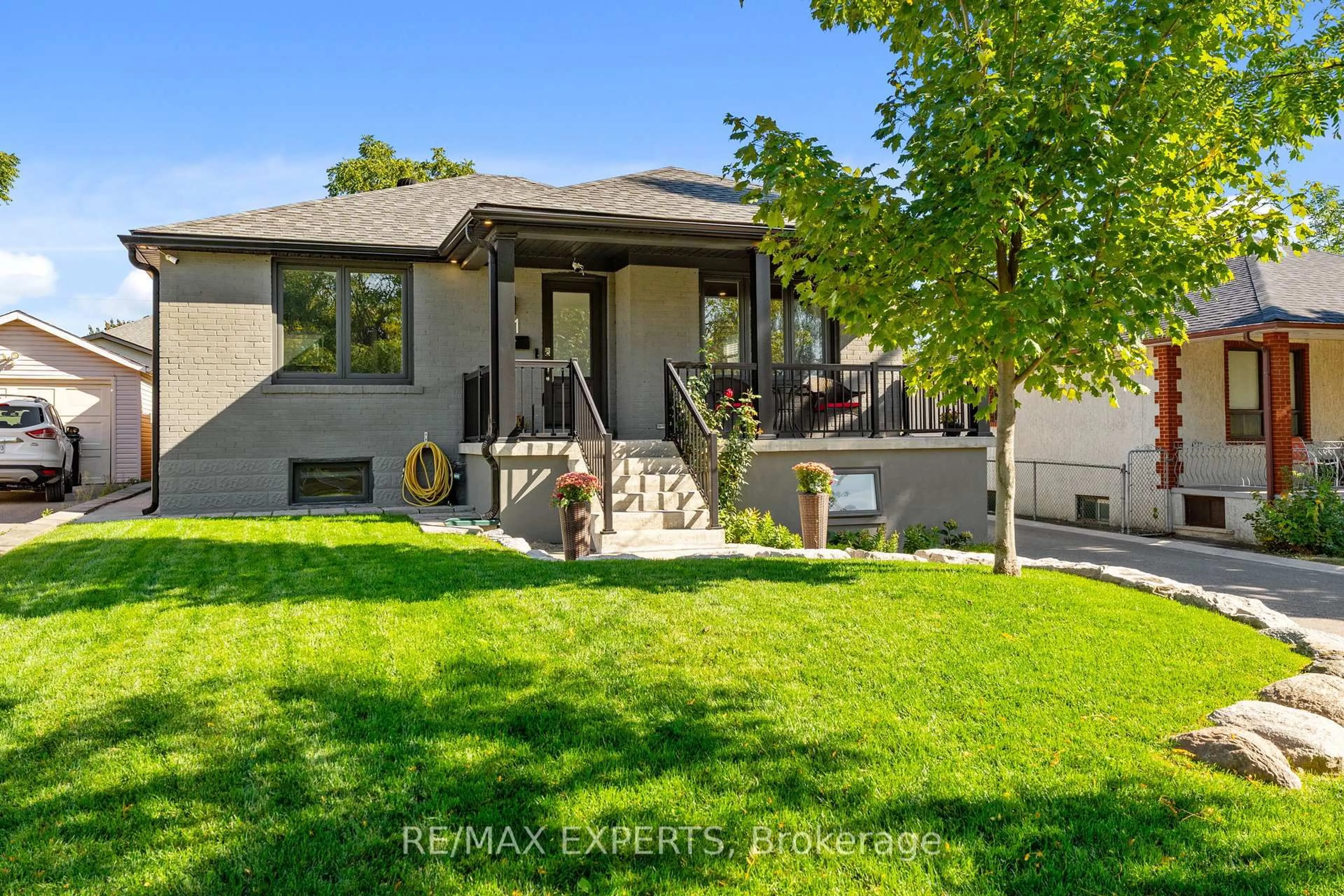 Home with vinyl exterior material, street for 11 Smallwood Dr, Toronto Ontario M3M 1K9