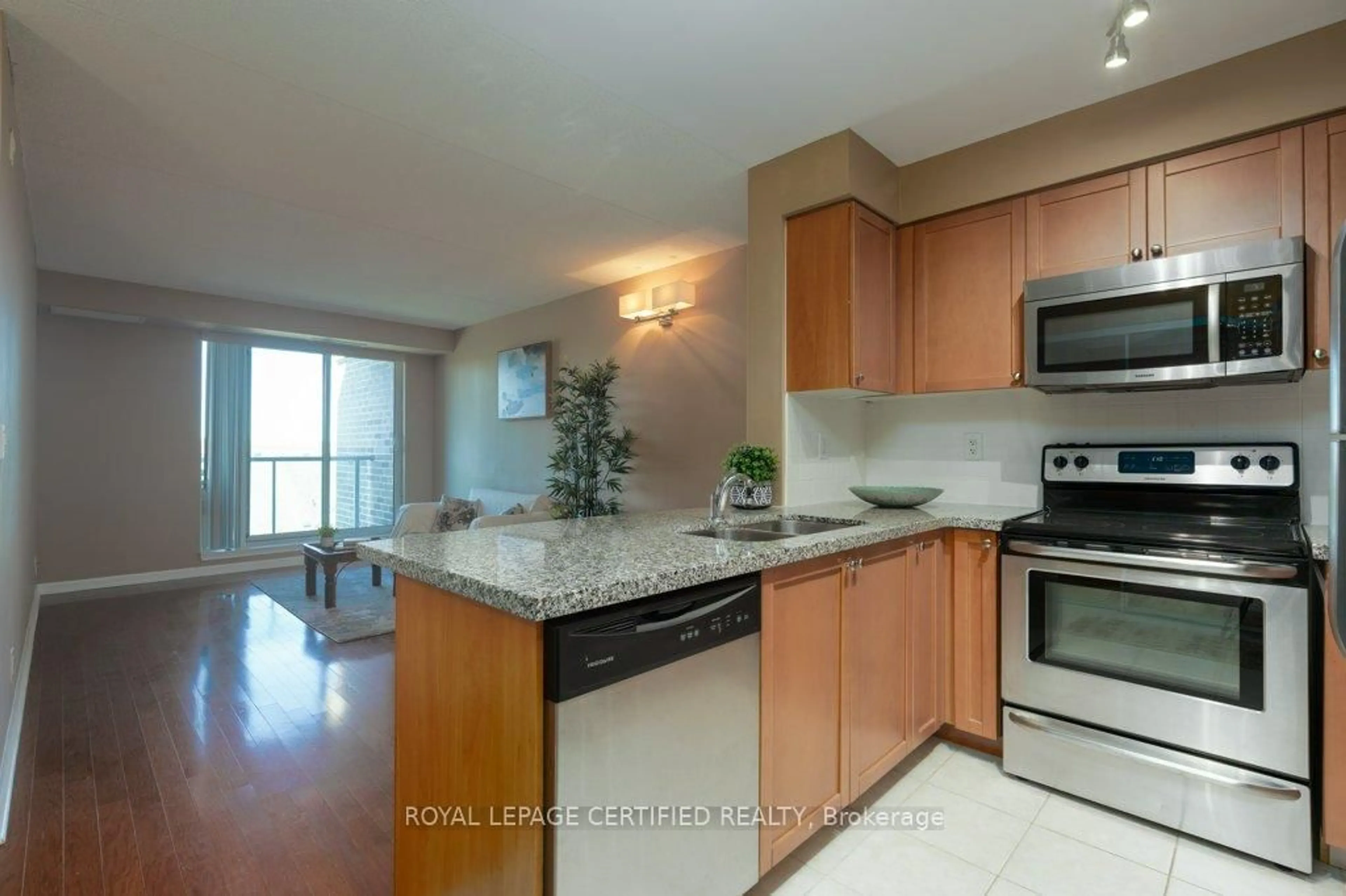 Open concept kitchen, ceramic/tile floor for 65 Via Rosedale #317, Brampton Ontario L6R 3N8