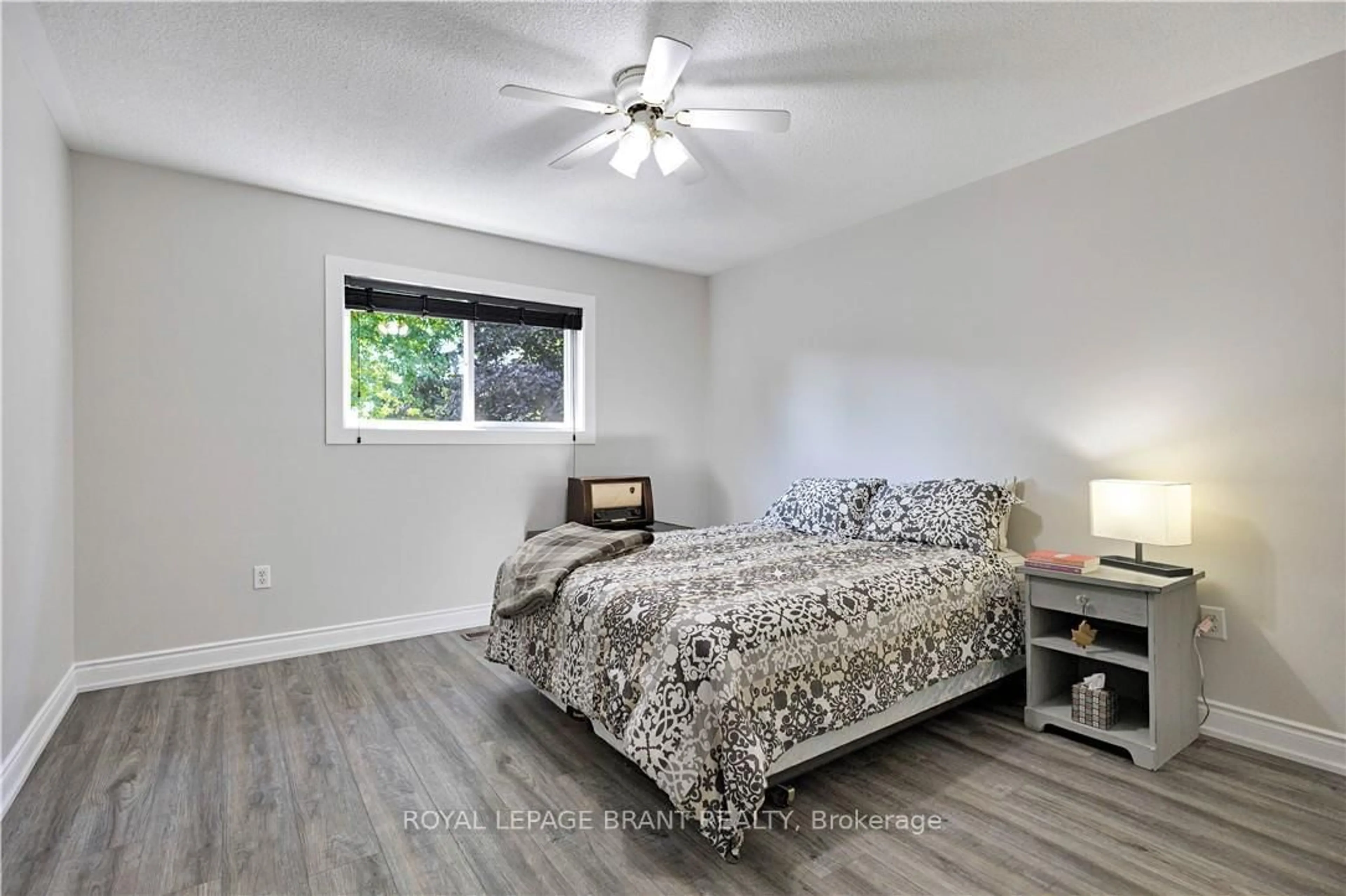 Bedroom with bed, wood/laminate floor for 10 Harley Ave, Halton Hills Ontario L7G 5R8