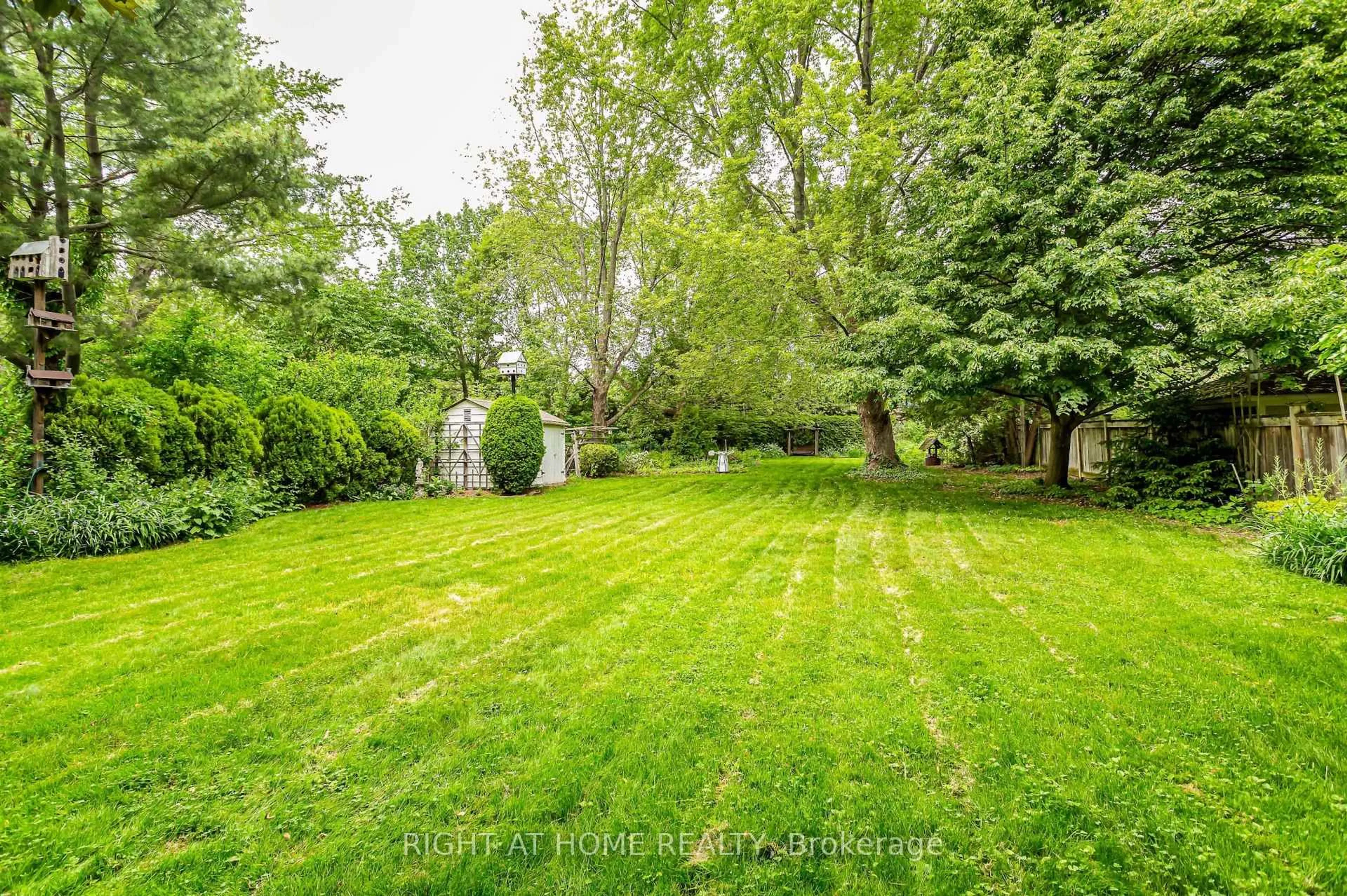 A pic from outside/outdoor area/front of a property/back of a property/a pic from drone, forest/trees view for 411 Maplehurst Ave, Oakville Ontario L6L 4Y3