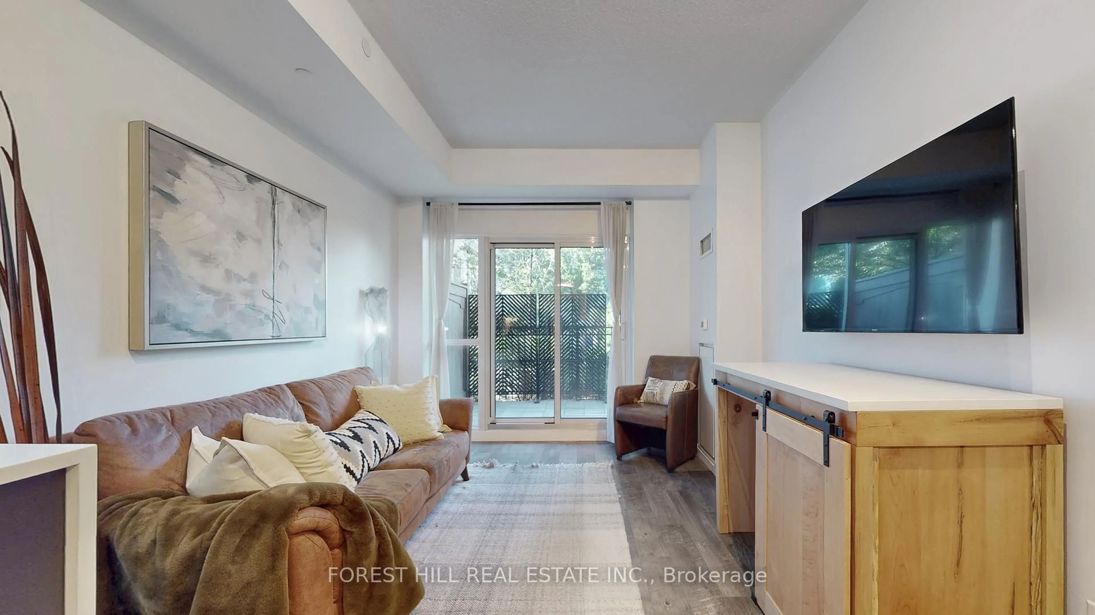 Living room with furniture, unknown for 165 Legion Rd #434, Toronto Ontario M8Y 0A1