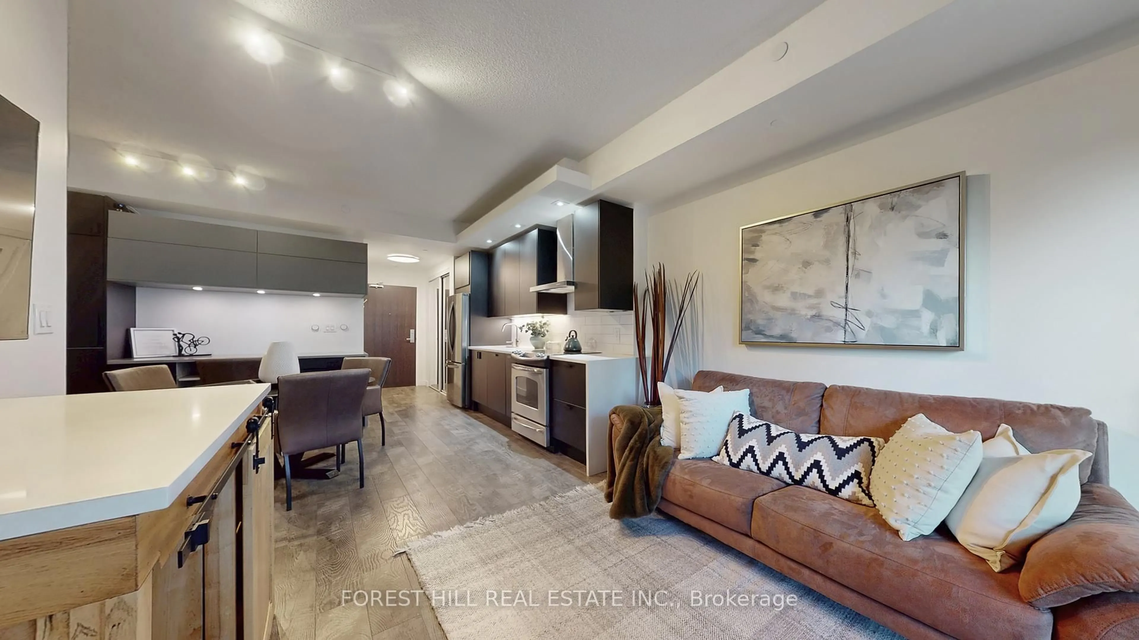 Living room with furniture, ceramic/tile floor for 165 Legion Rd #434, Toronto Ontario M8Y 0A1