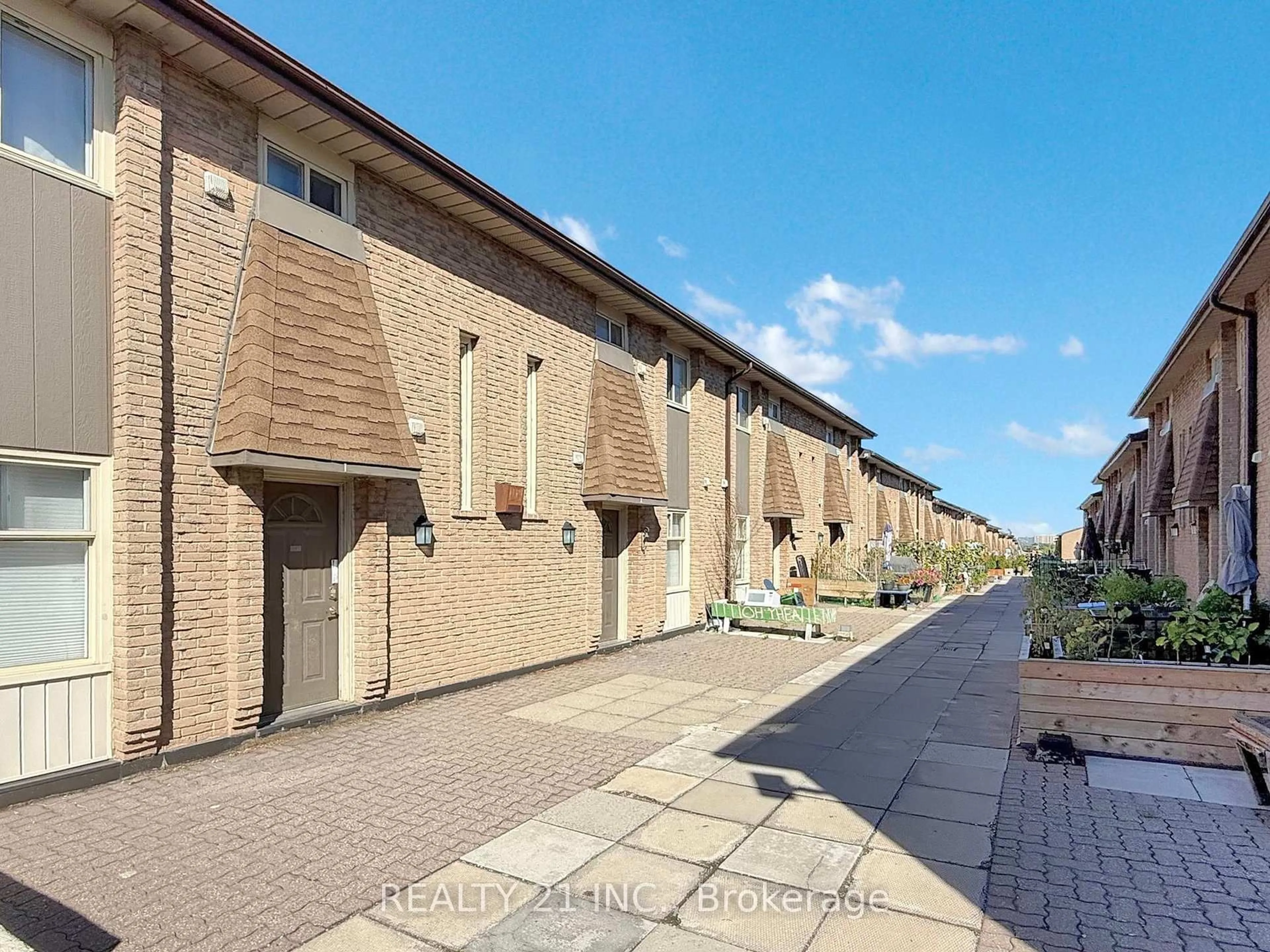 A pic from outside/outdoor area/front of a property/back of a property/a pic from drone, street for 40 Rexdale Blvd #2, Toronto Ontario M9W 5Z3