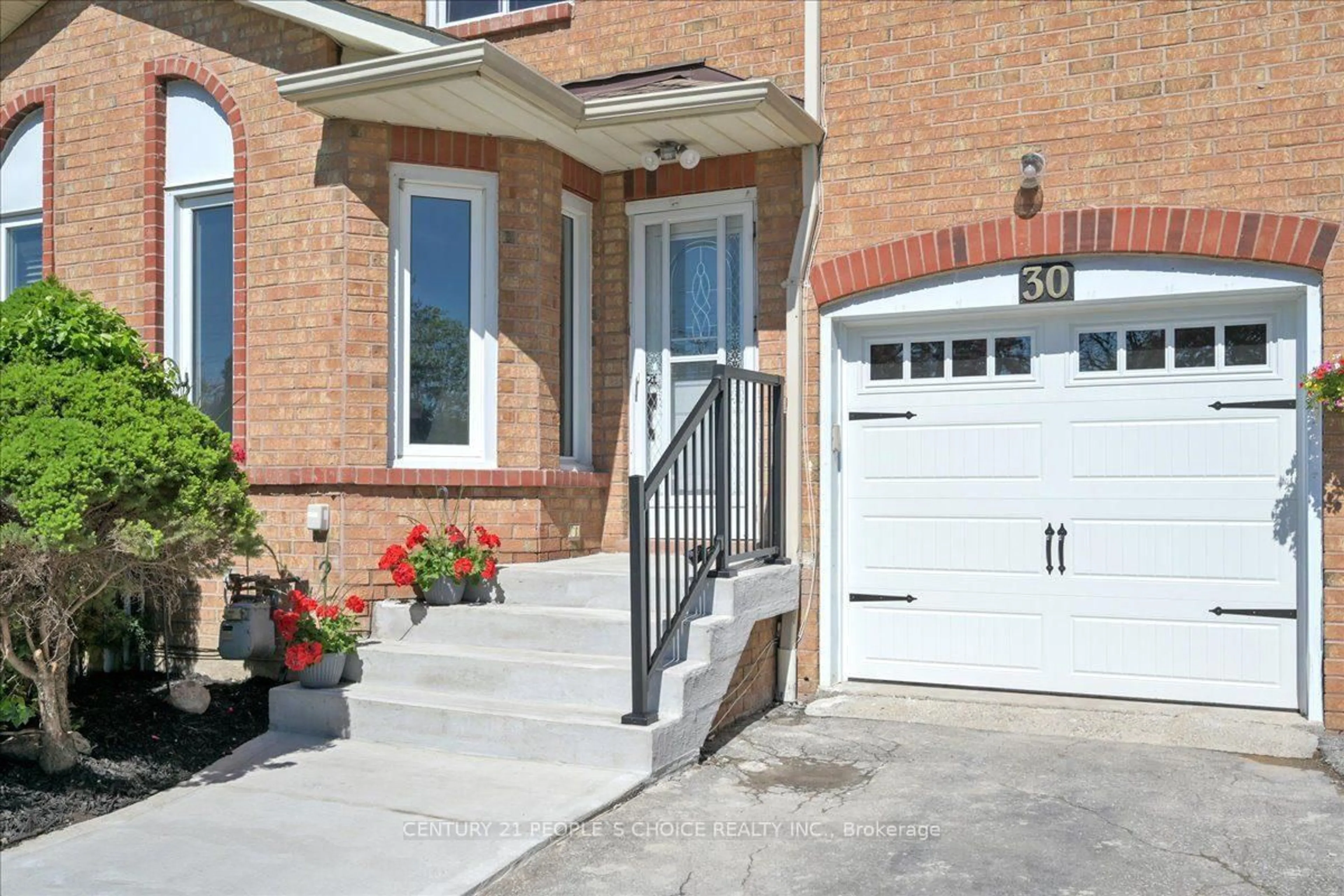 Home with brick exterior material, street for 365 Tailfeather Cres #30, Mississauga Ontario L4Z 2Z8