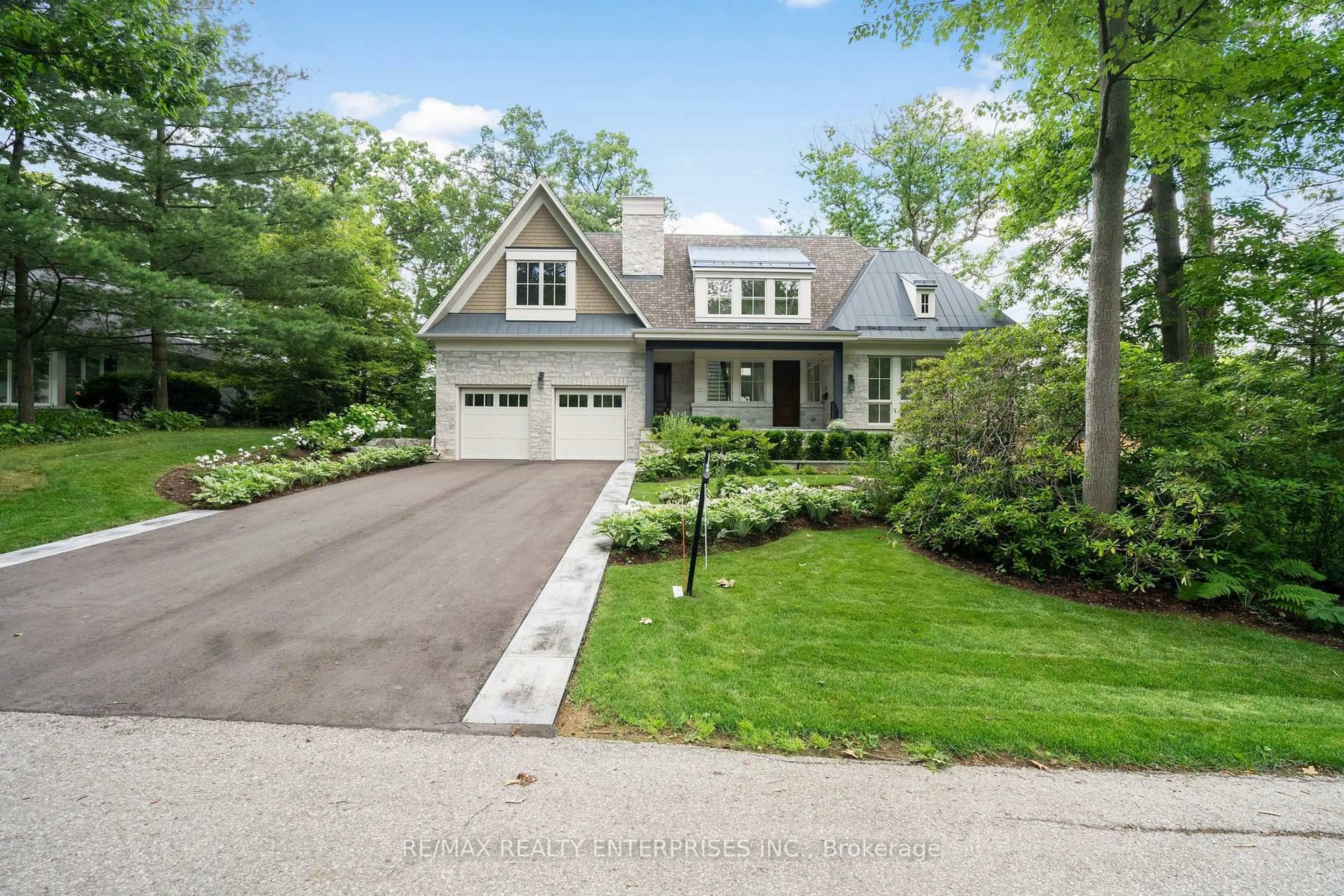 Home with brick exterior material, street for 1322 Minaki Rd, Mississauga Ontario L5G 2X4