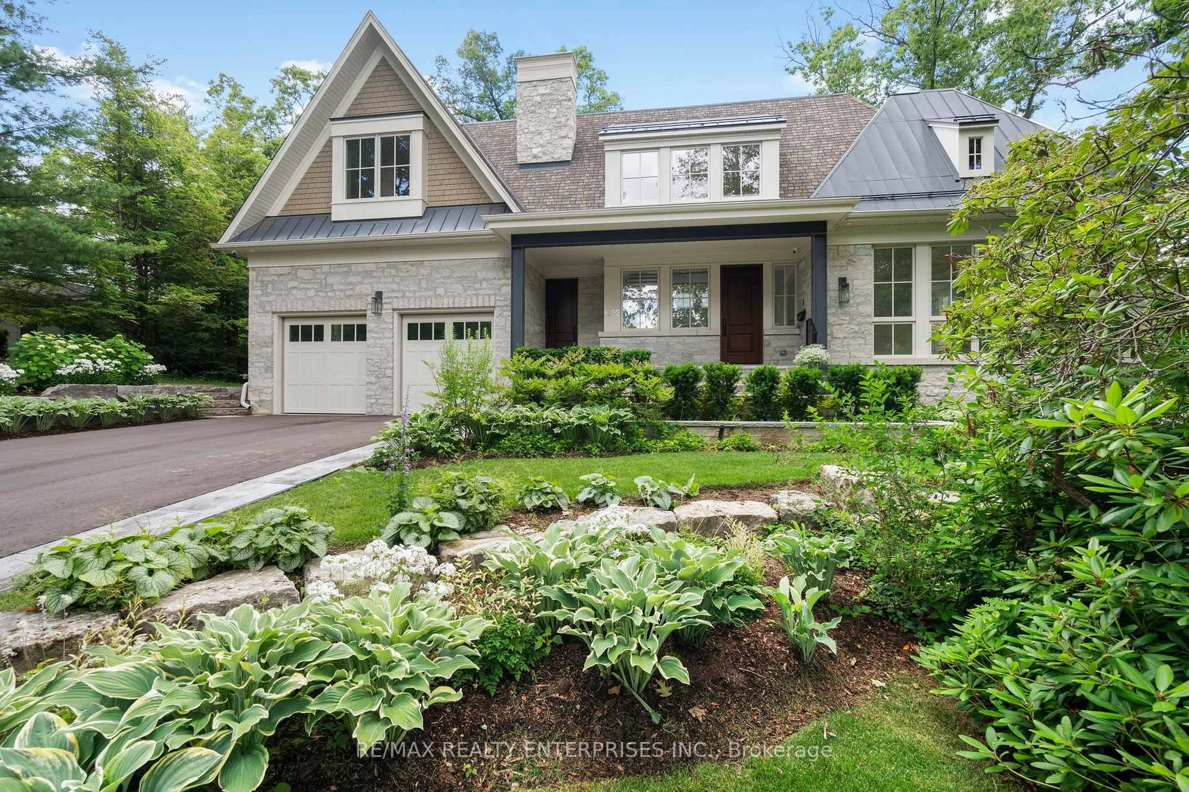Home with brick exterior material, street for 1322 Minaki Rd, Mississauga Ontario L5G 2X4