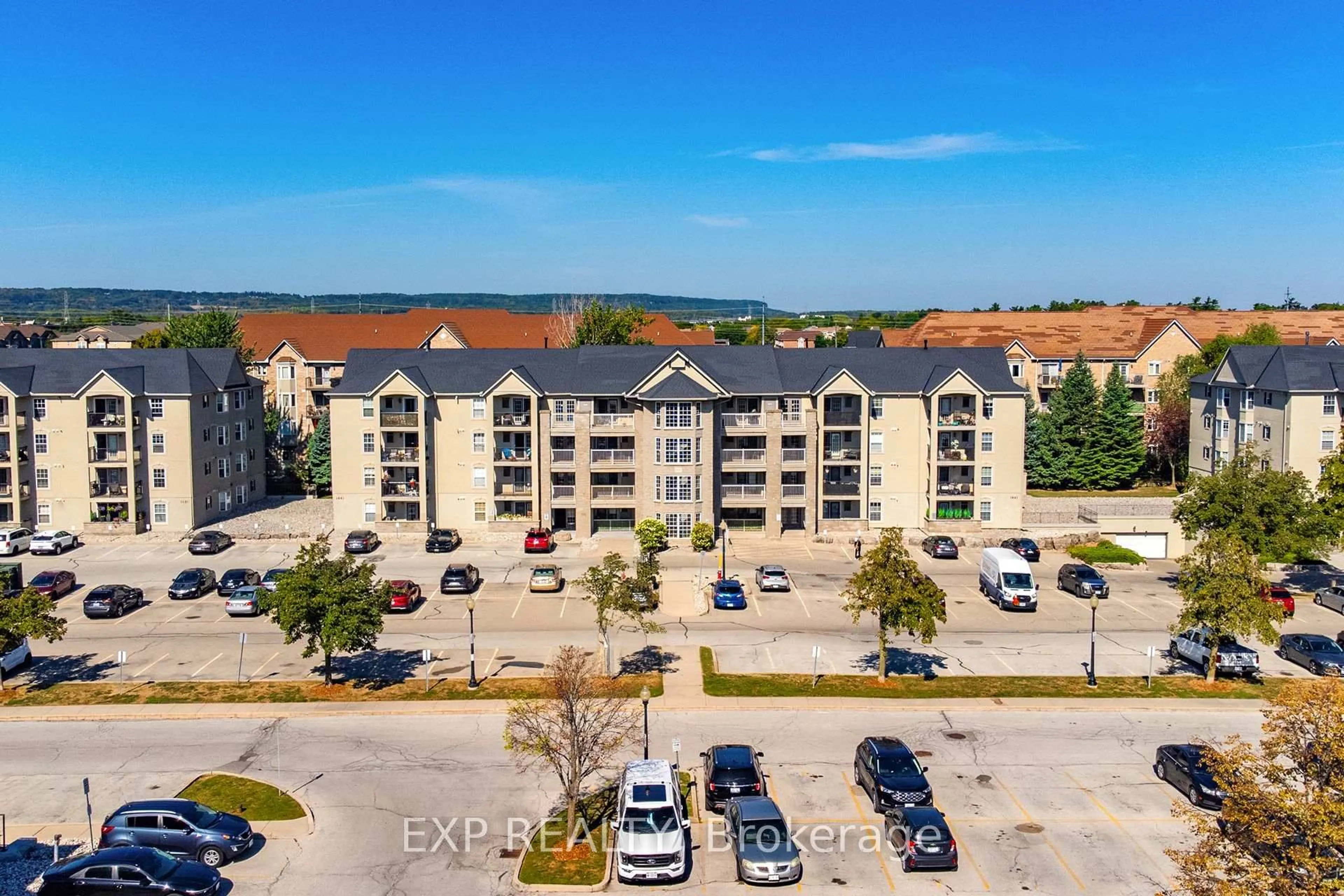 A pic from outside/outdoor area/front of a property/back of a property/a pic from drone, building for 1441 Walker's Line #209, Burlington Ontario L7M 4P2