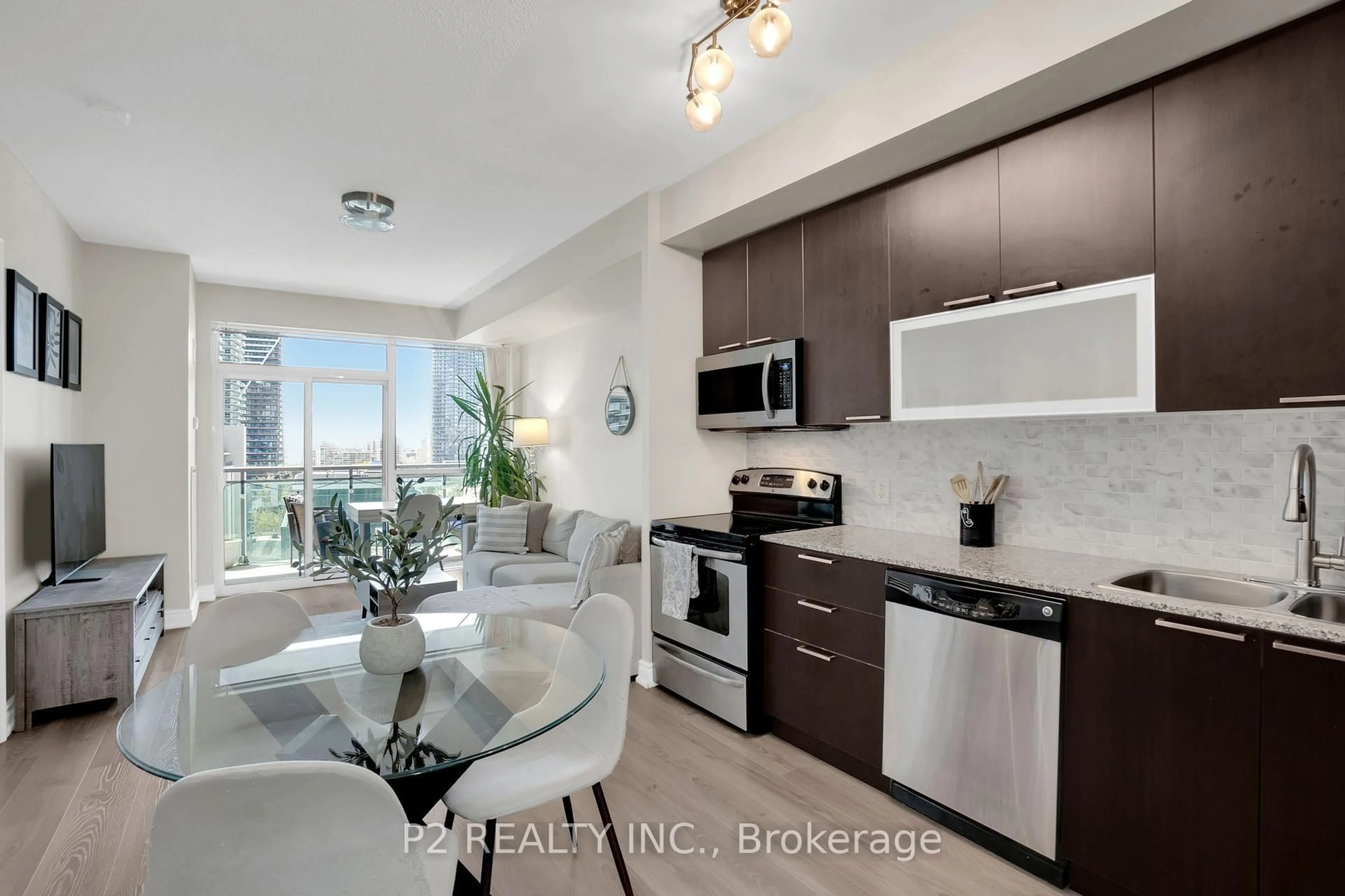 Open concept kitchen, ceramic/tile floor for 16 Brookers Lane #1002, Toronto Ontario M8V 0A5