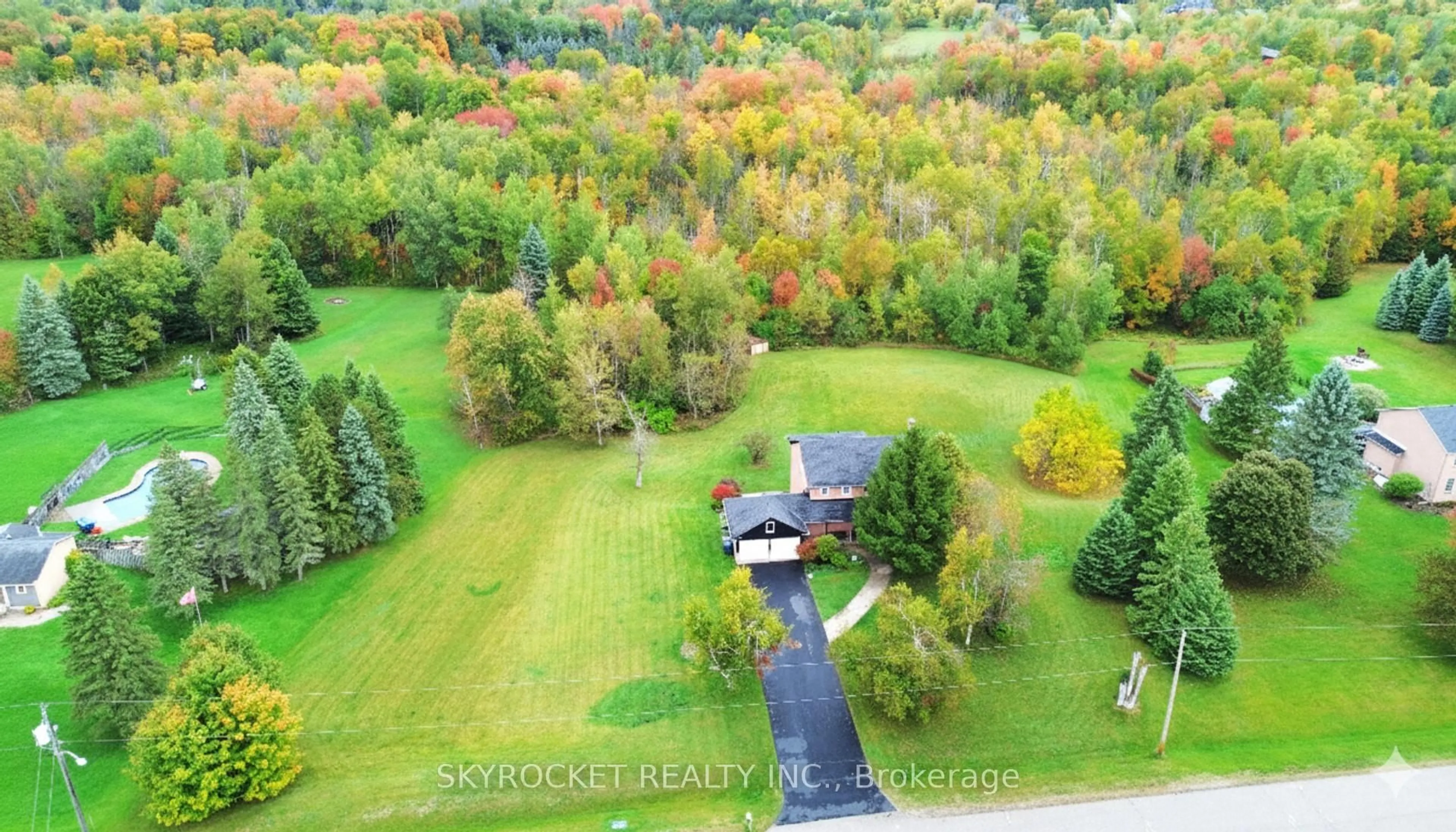 A pic from outside/outdoor area/front of a property/back of a property/a pic from drone, forest/trees view for 41 Elite Rd, Caledon Ontario L7K 0L2