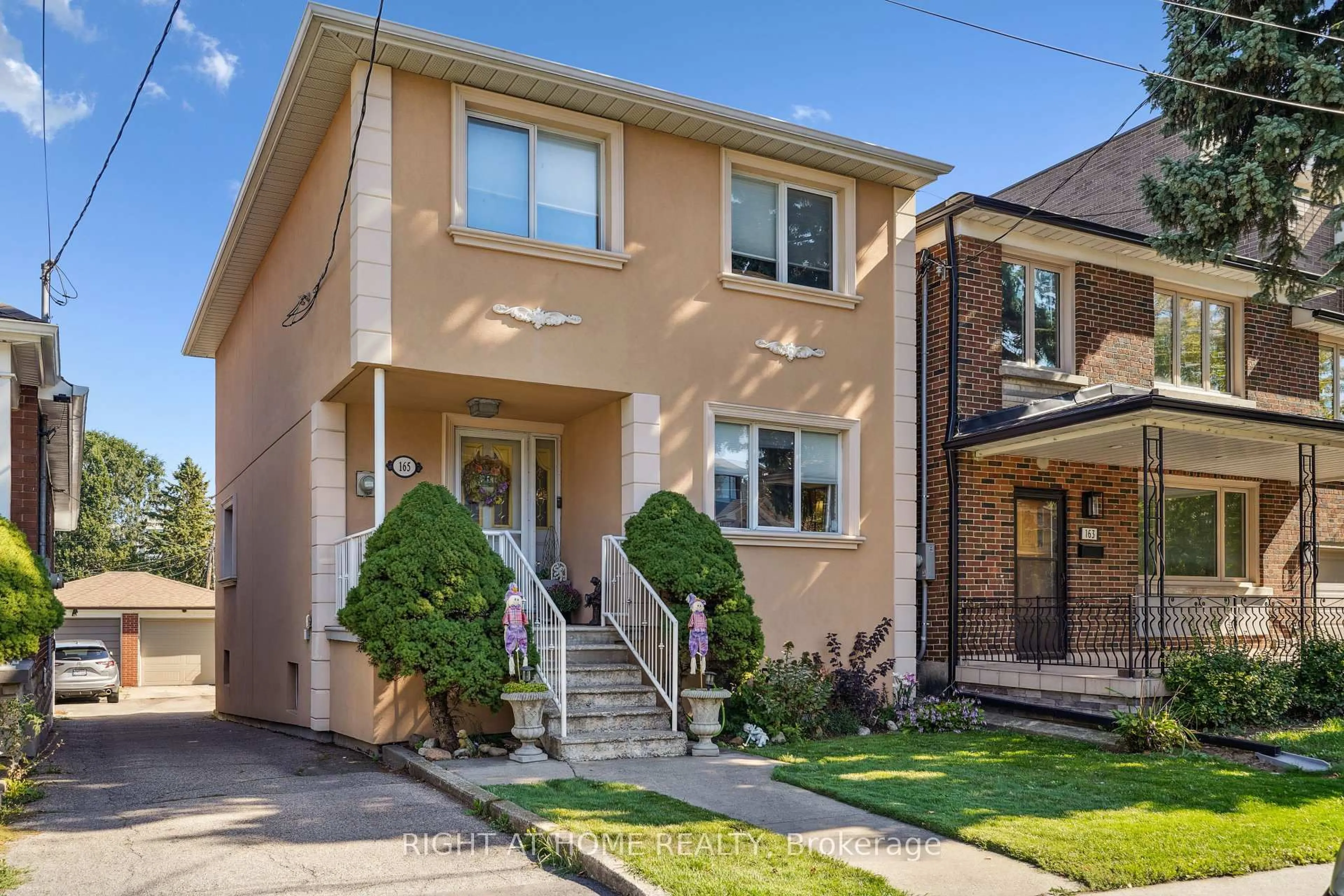 Home with brick exterior material, street for 165 Locksley Ave, Toronto Ontario M6B 3N4