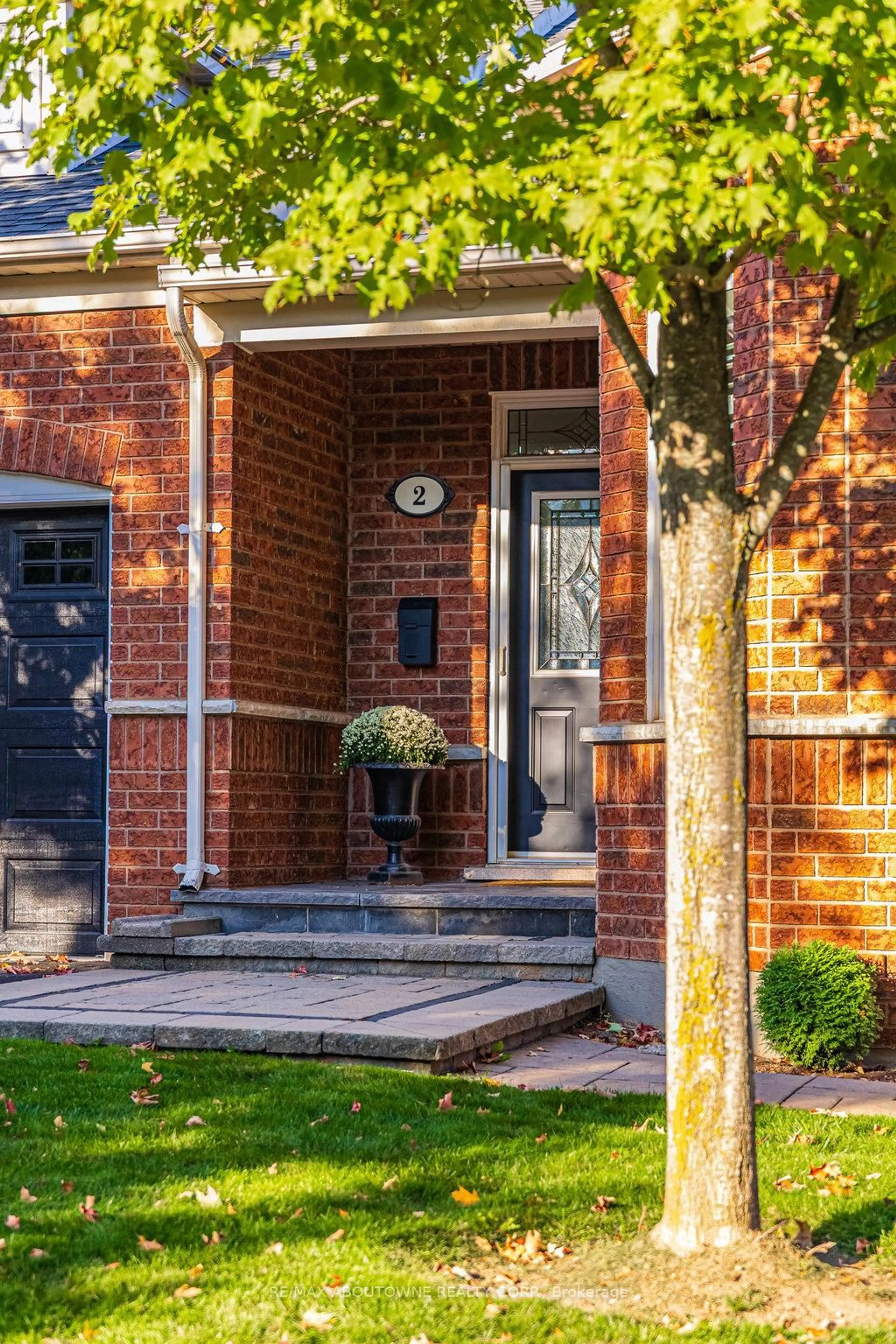 Home with brick exterior material, street for 2590 Carberry Way #2, Oakville Ontario L6M 5G2