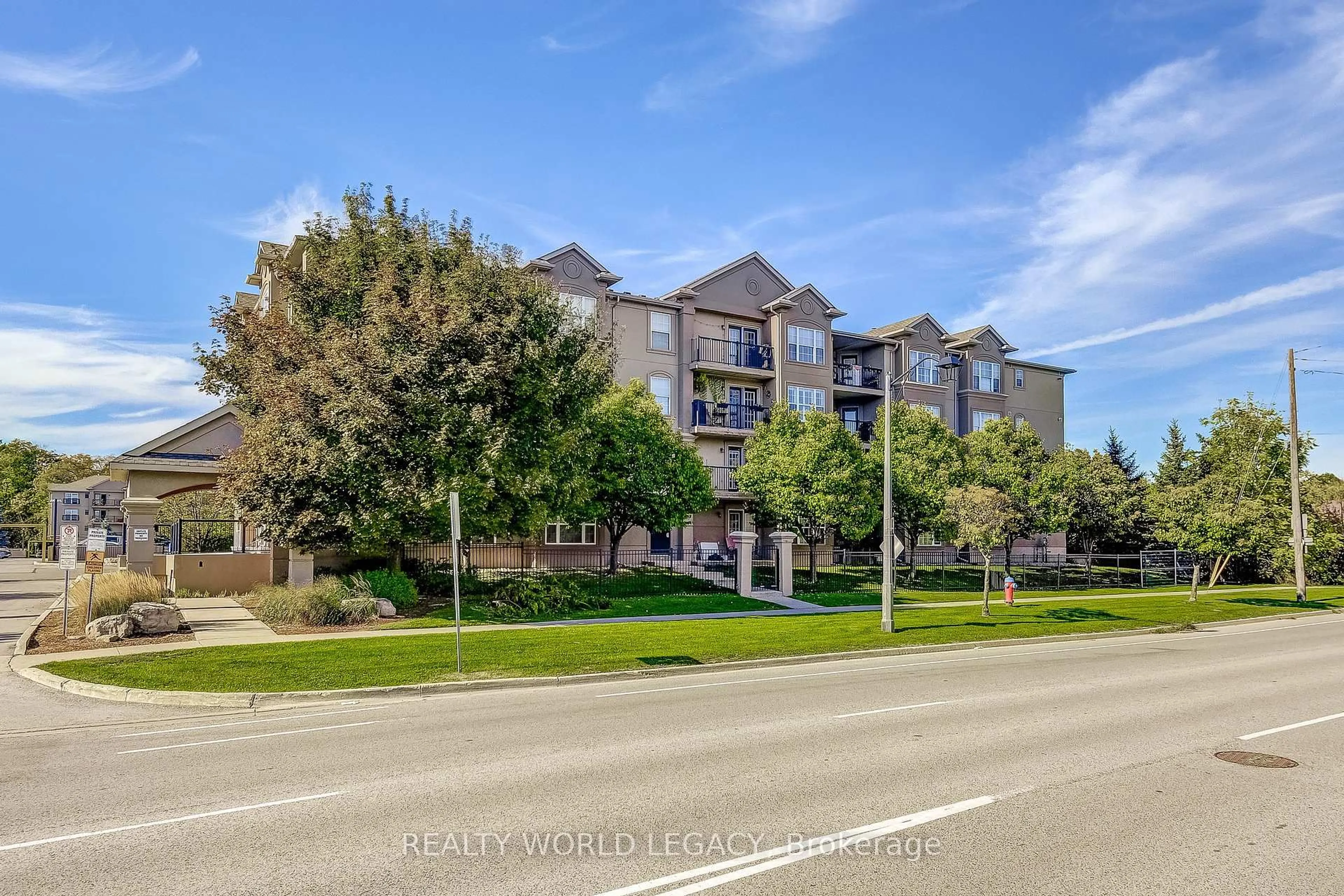 A pic from outside/outdoor area/front of a property/back of a property/a pic from drone, street for 2055 Appleby Line #103, Burlington Ontario L7L 7H1
