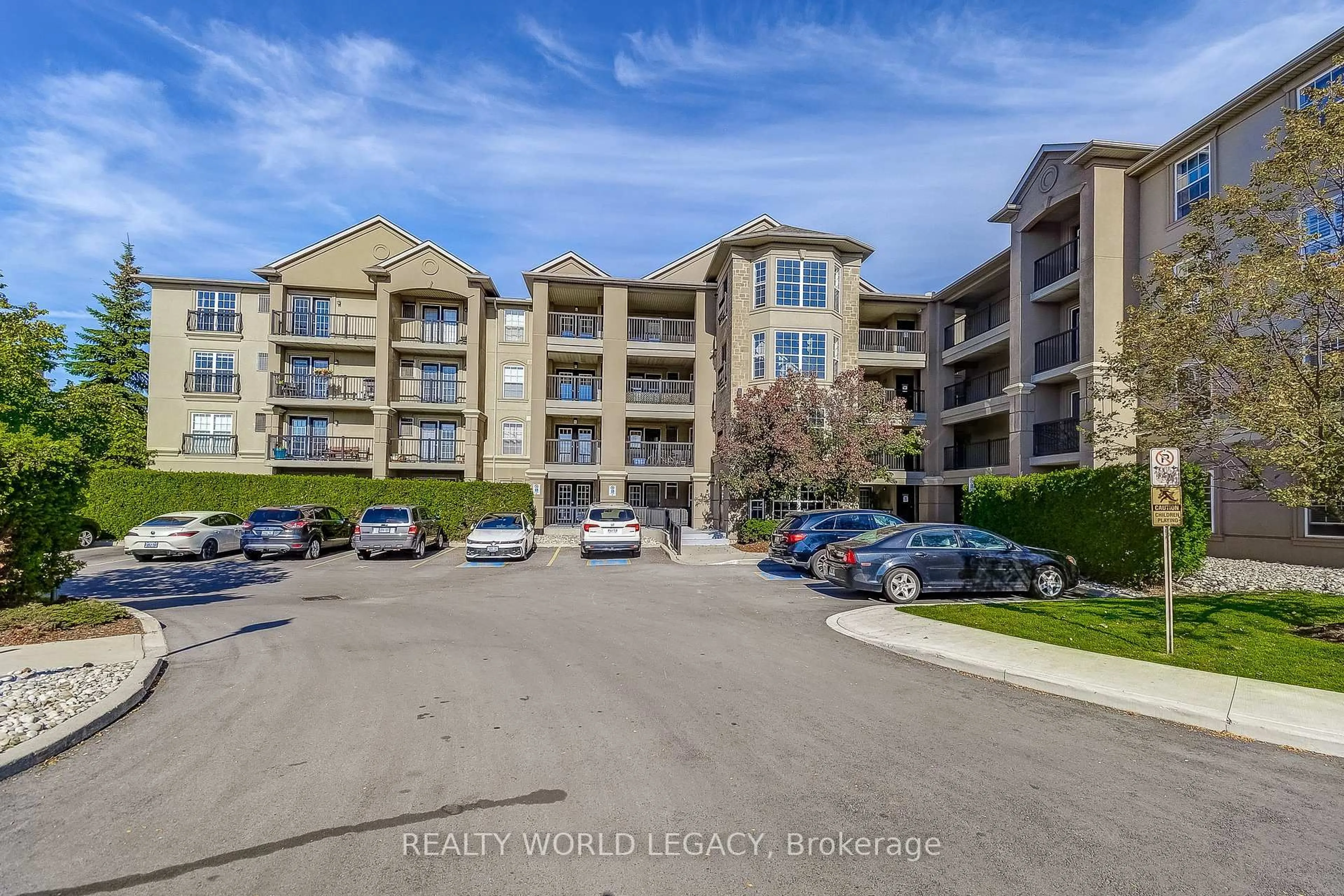 A pic from outside/outdoor area/front of a property/back of a property/a pic from drone, water/lake/river/ocean view for 2055 Appleby Line #103, Burlington Ontario L7L 7H1