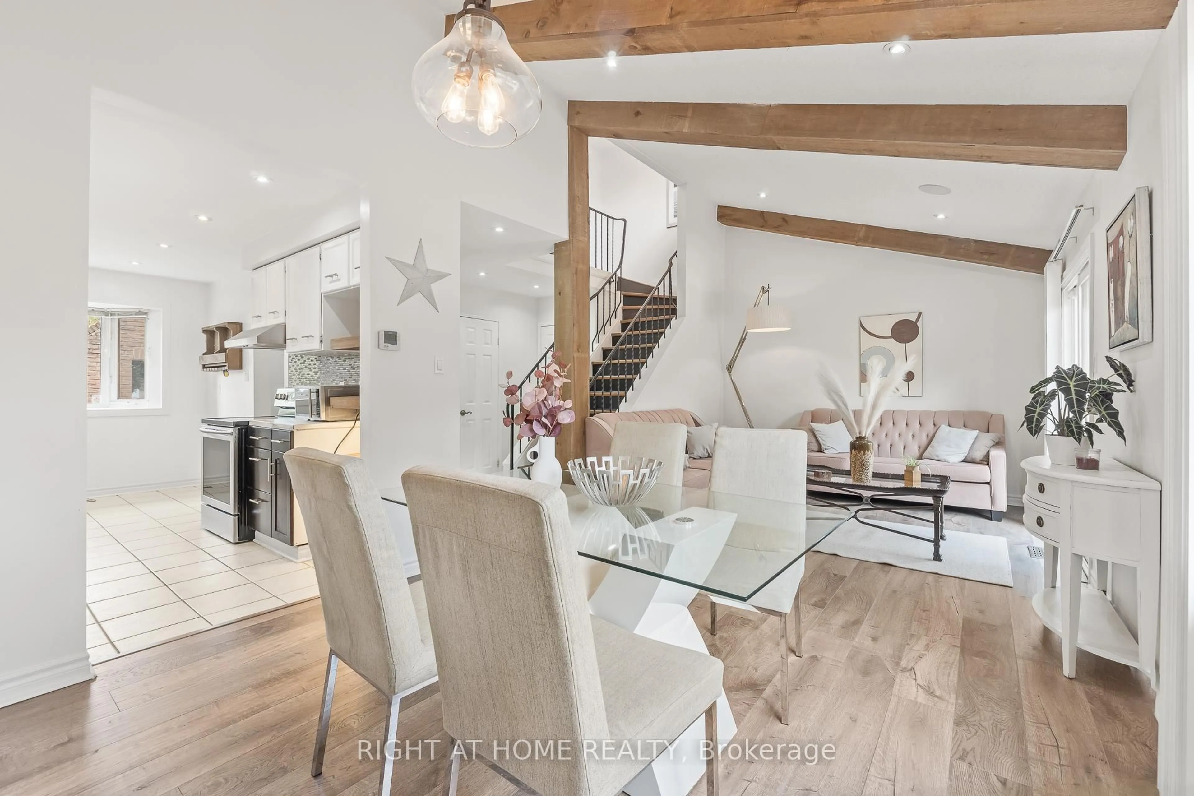 Open concept kitchen, wood/laminate floor for 55 Cowan Rd, Brampton Ontario L6X 2P9