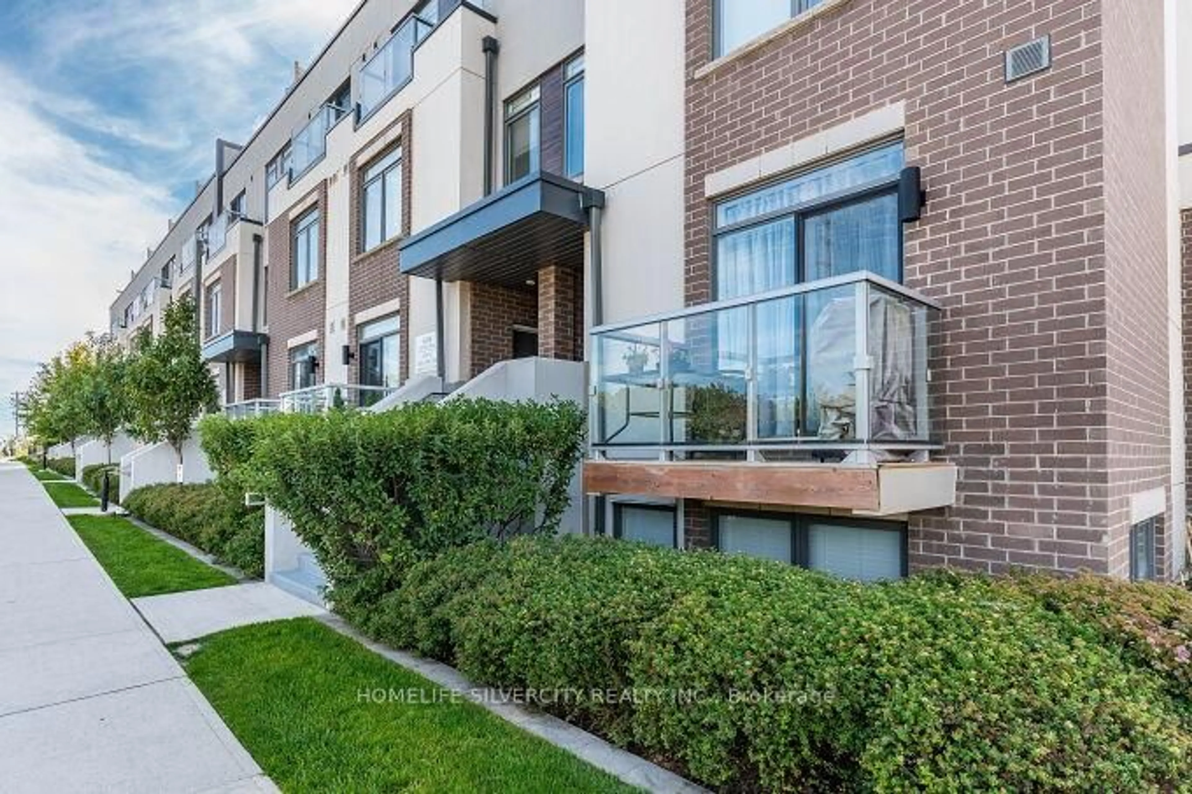 Home with brick exterior material, street for 3058 Sixth Line #104, Oakville Ontario L6M 4J9