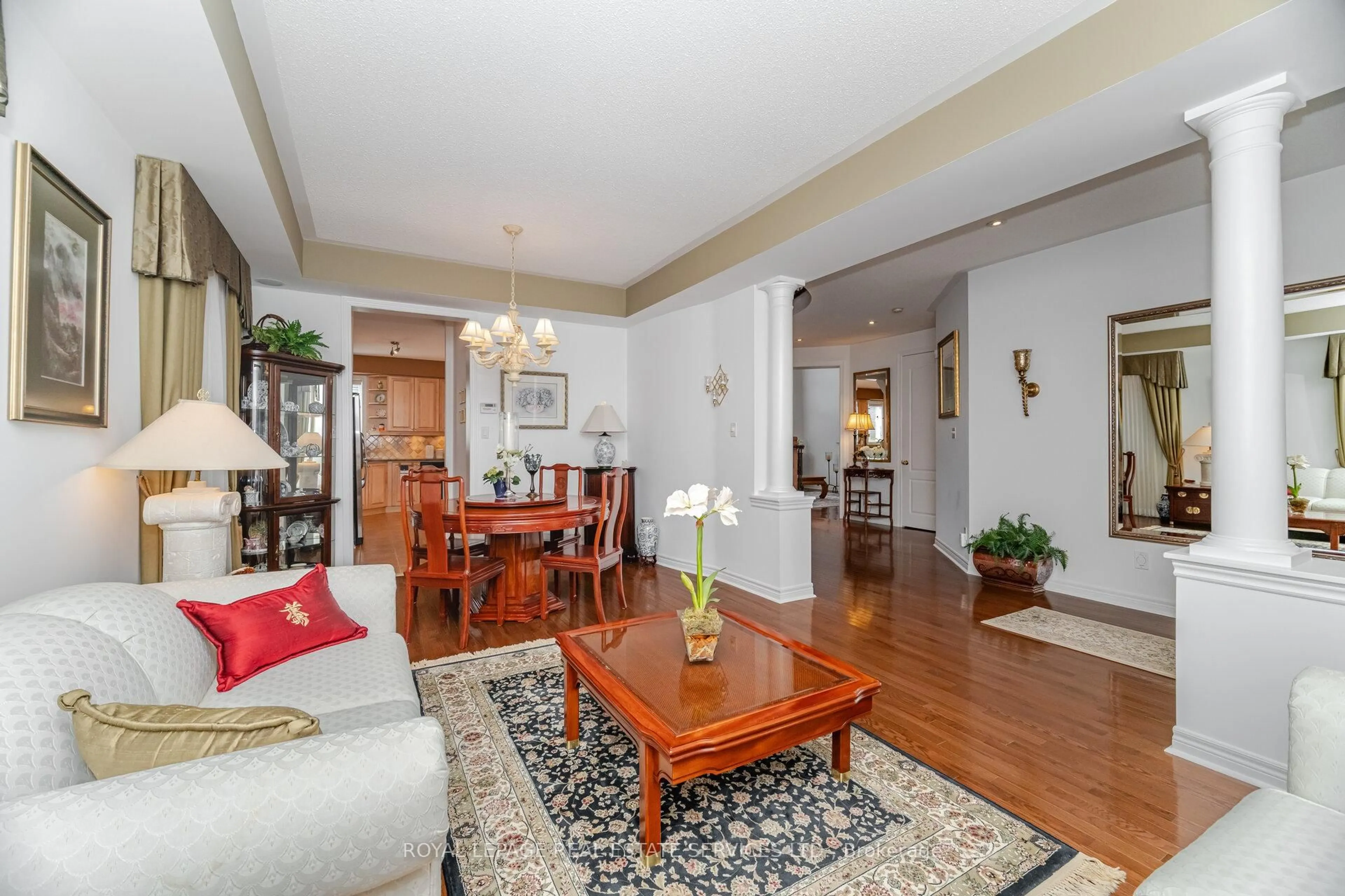 Living room with furniture, wood/laminate floor for 3474 Wavecrest St, Oakville Ontario L6L 6T7