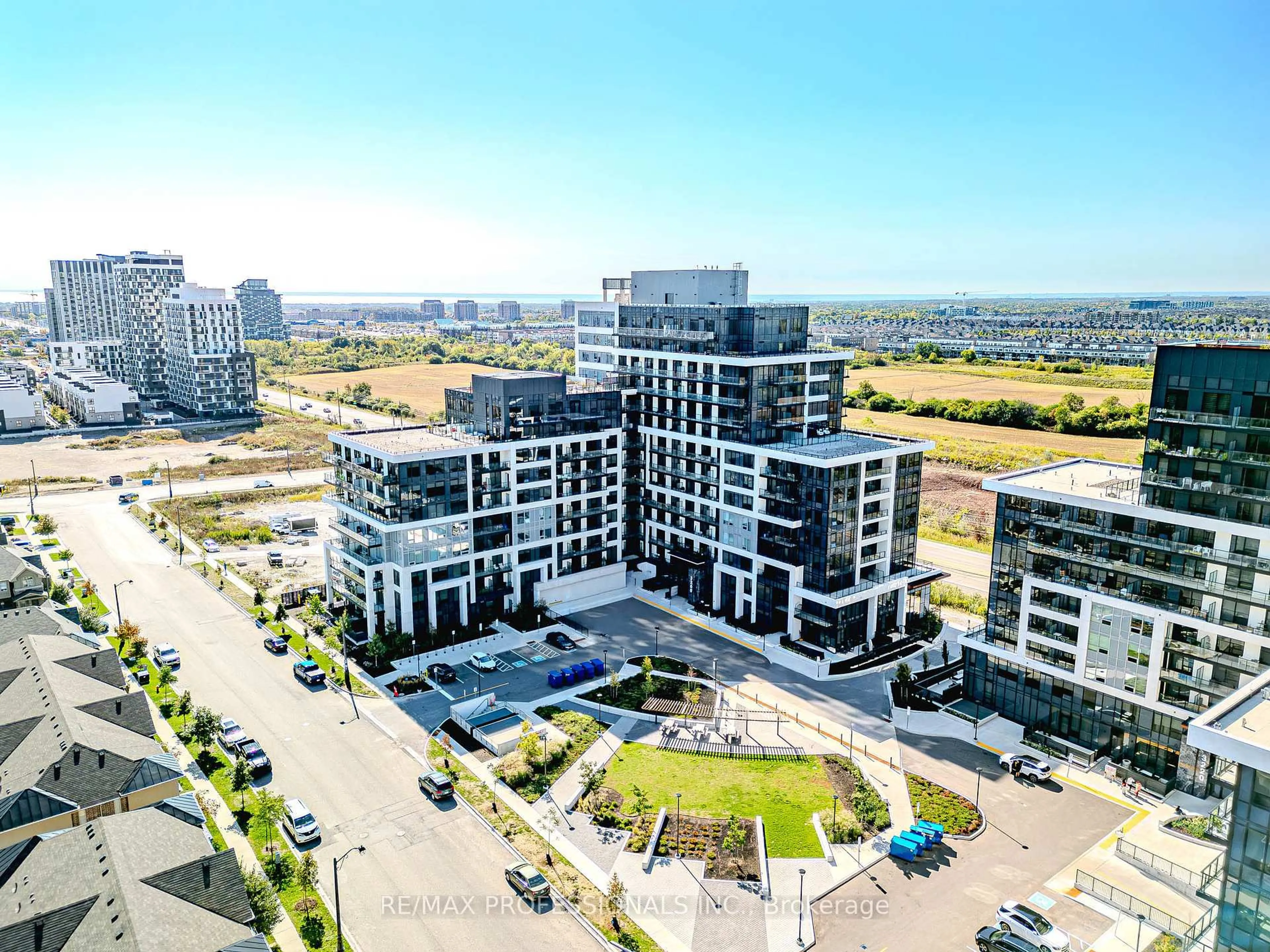 A pic from outside/outdoor area/front of a property/back of a property/a pic from drone, city buildings view from balcony for 3200 William Coltson Ave #311, Oakville Ontario L6H 7W6