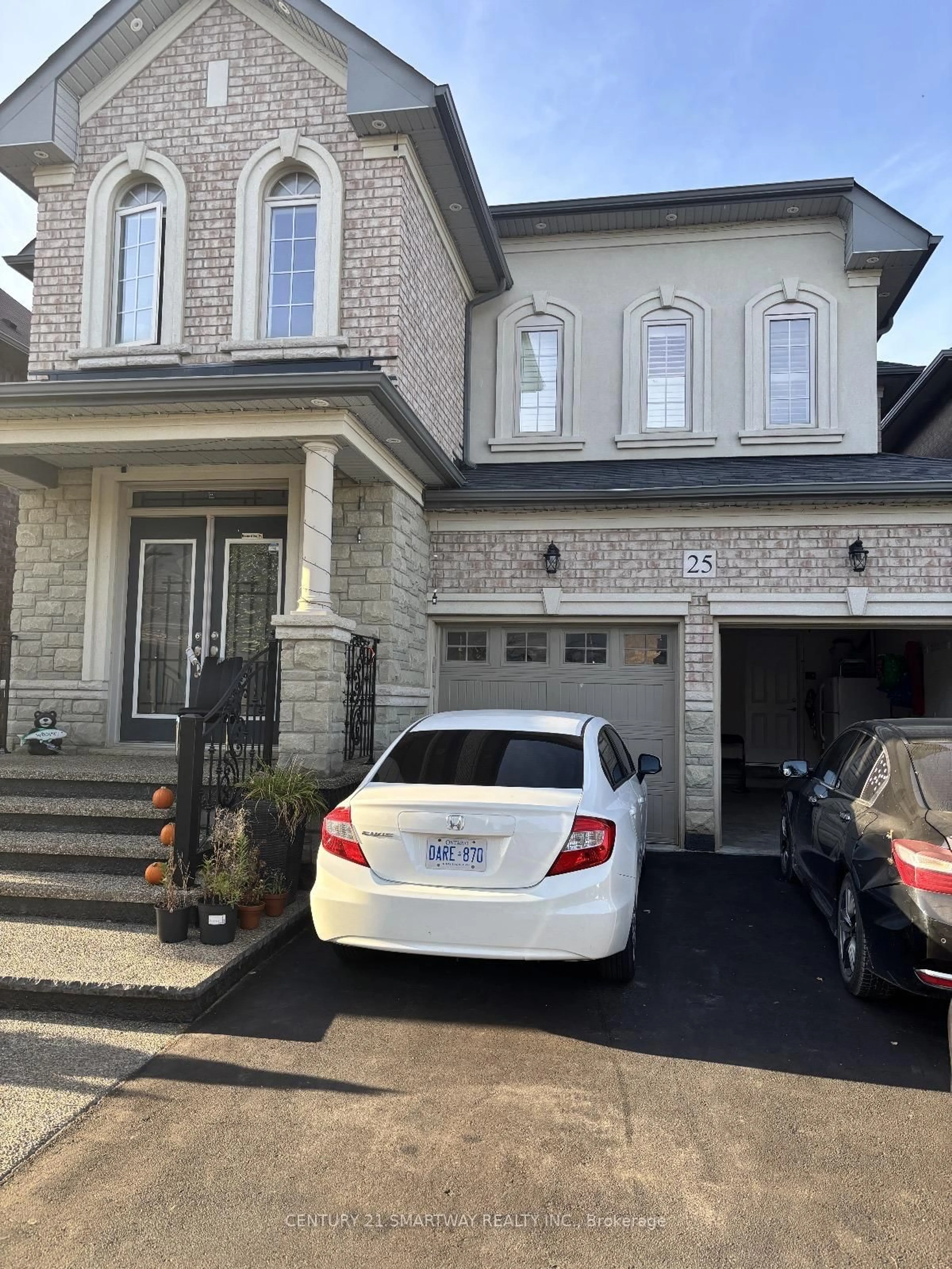 Home with brick exterior material, street for 25 Bucksaw St, Brampton Ontario L7A 0G4