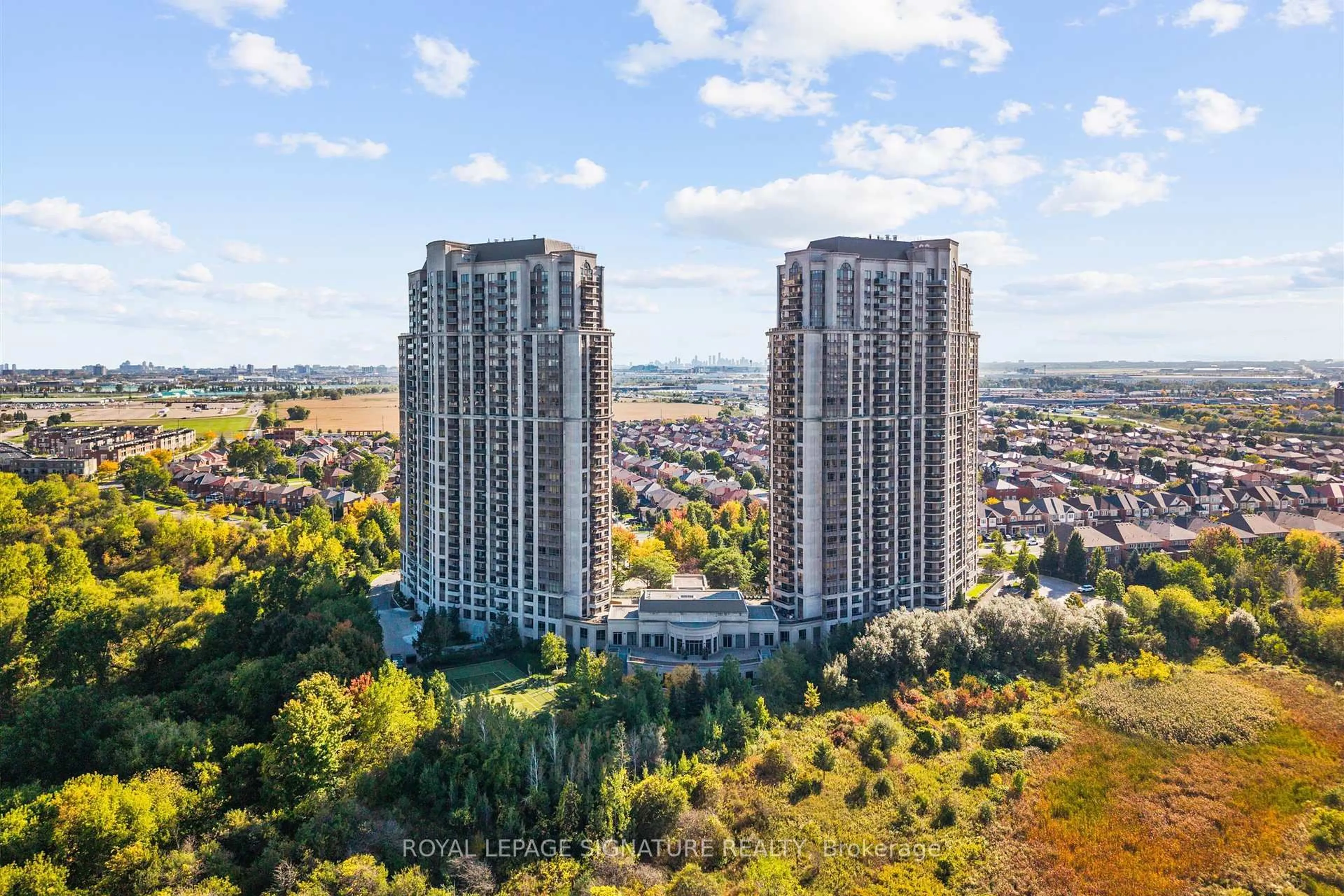 A pic from outside/outdoor area/front of a property/back of a property/a pic from drone, city buildings view from balcony for 710 Humberwood Blvd #2407, Toronto Ontario M9W 7J5