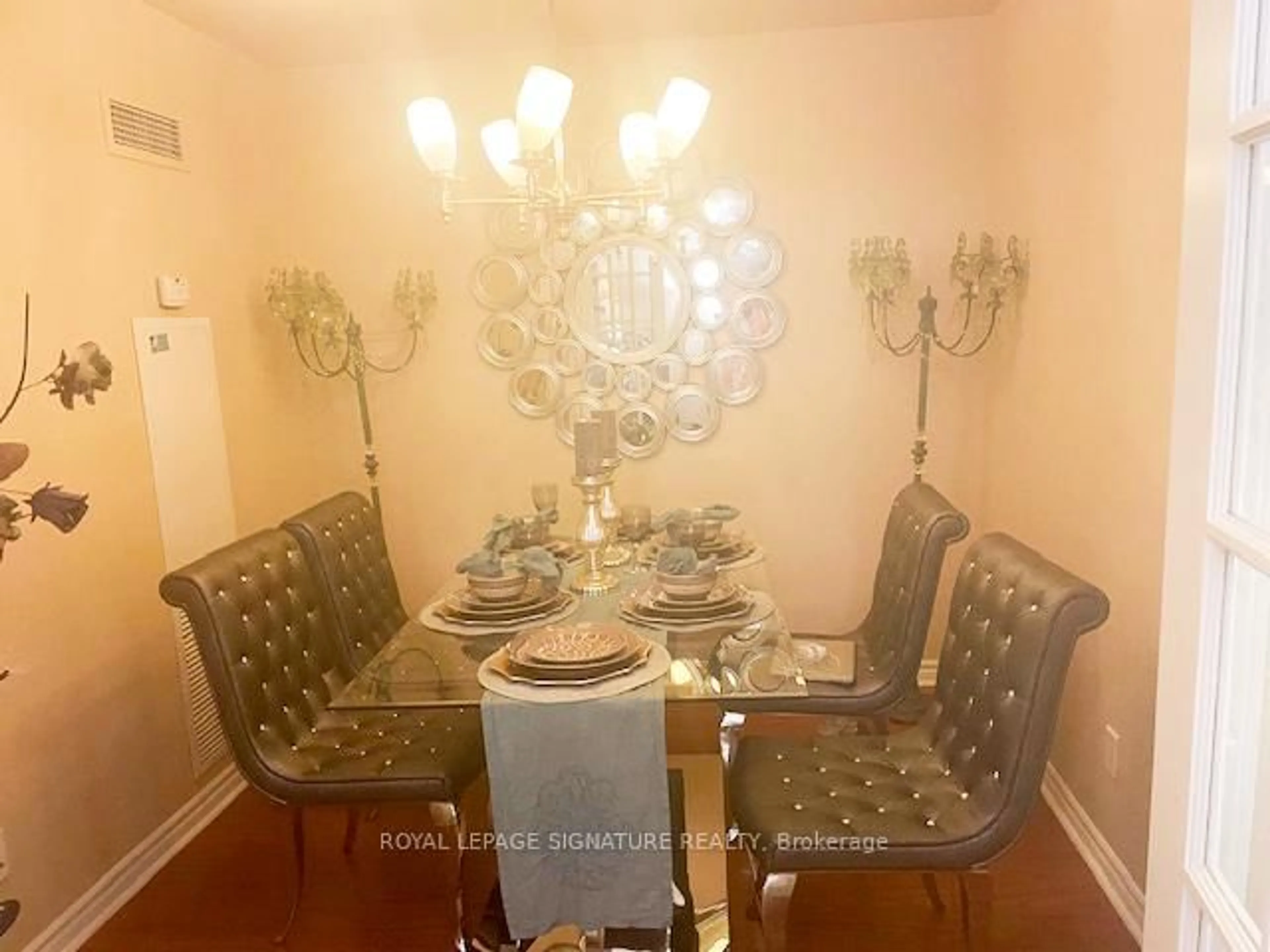 Dining room, wood/laminate floor for 25 Kingsbridge Garden Circ #224, Mississauga Ontario L5R 4B1