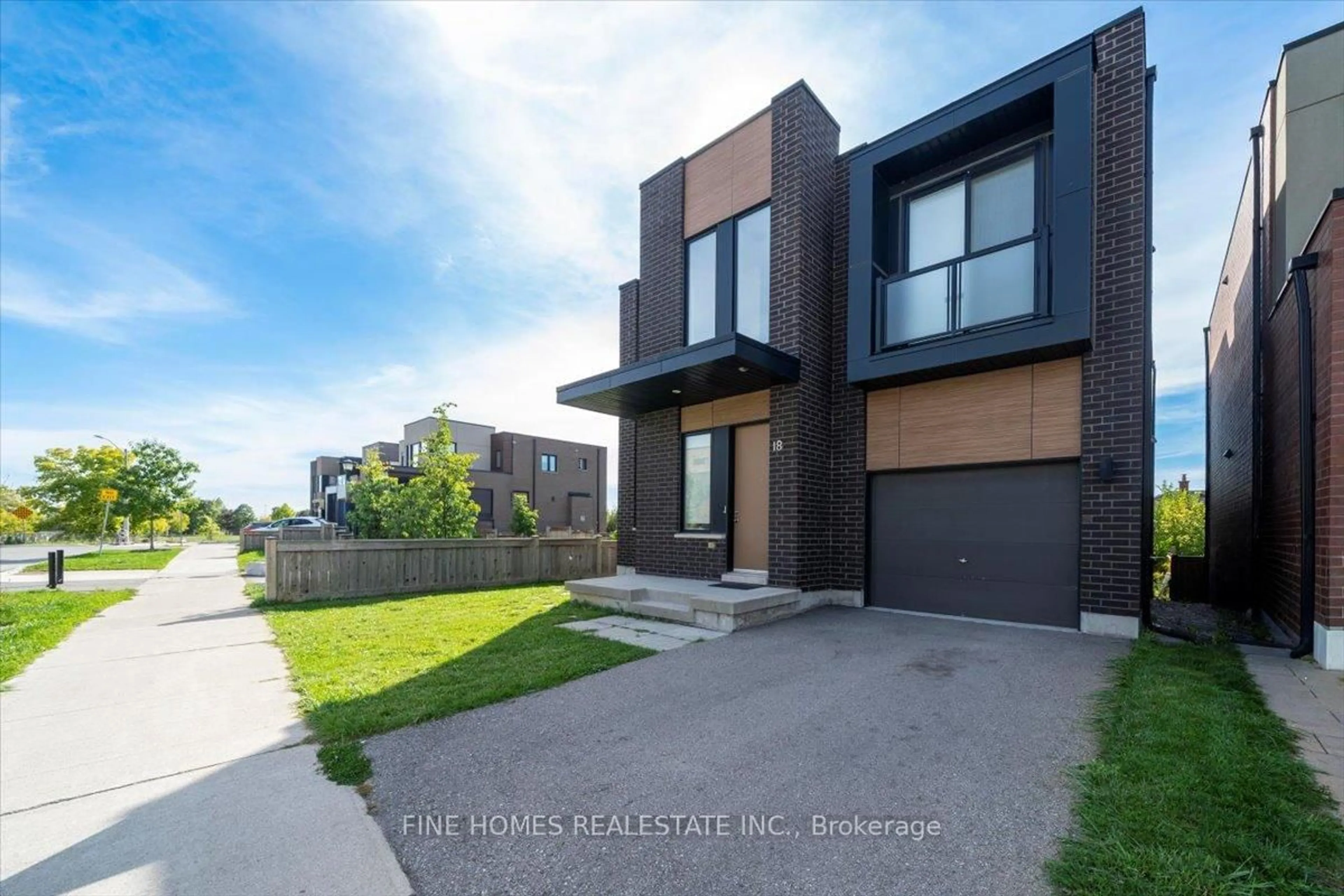 Home with brick exterior material, street for 18 STANLEY GREENE Blvd, Toronto Ontario M3K 0A9