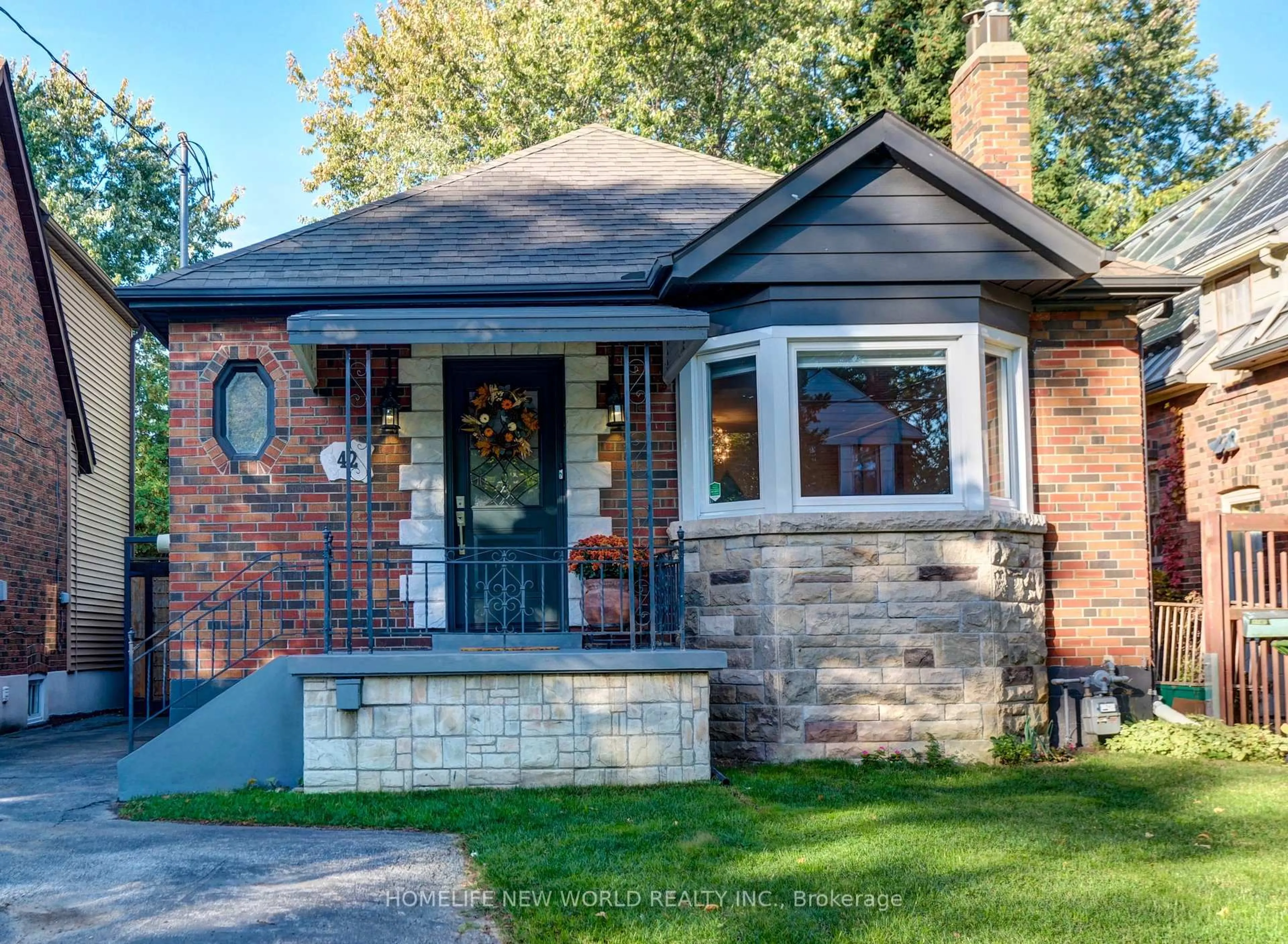 Home with brick exterior material, street for 42 Eleventh St, Toronto Ontario M8V 3G3