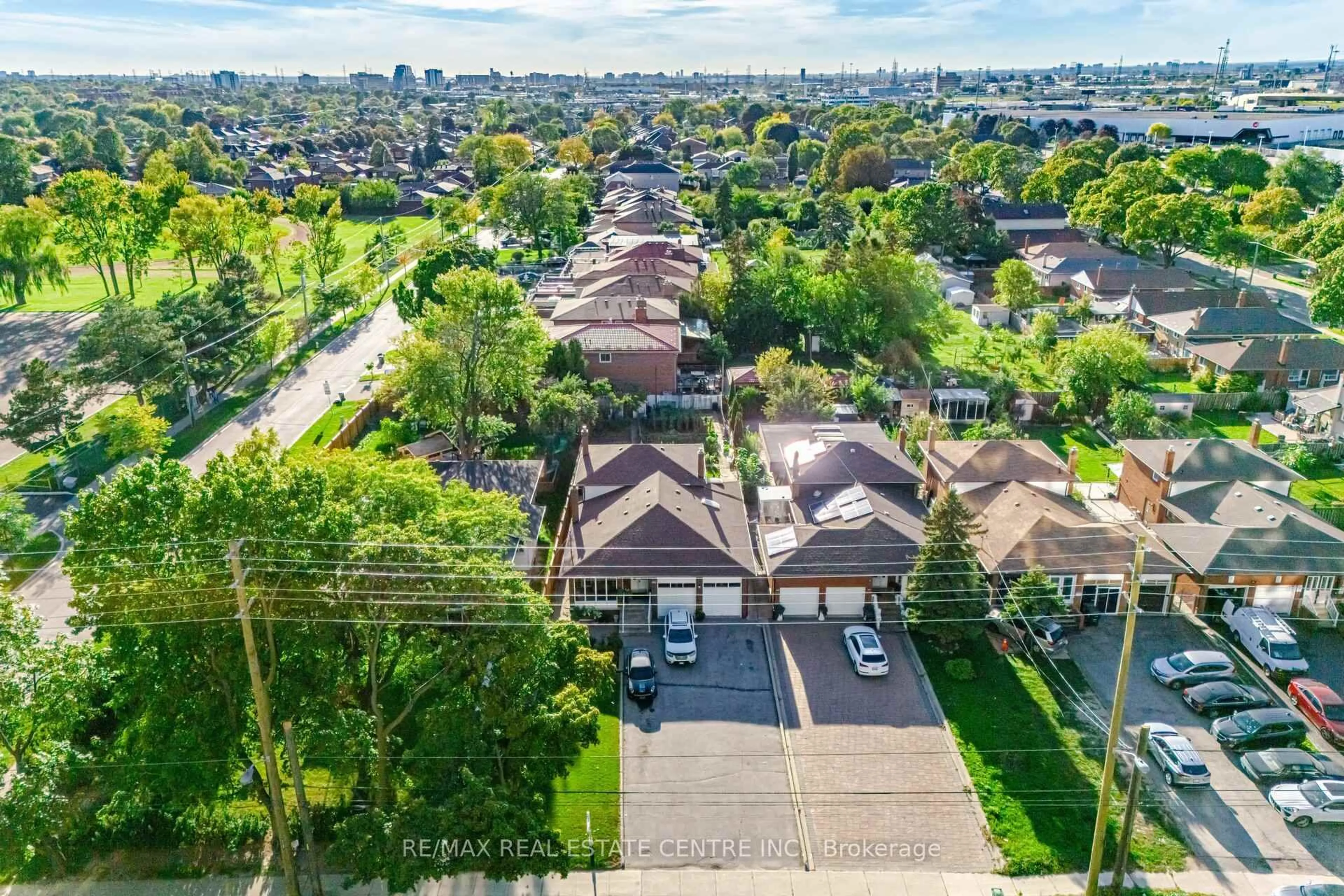 A pic from outside/outdoor area/front of a property/back of a property/a pic from drone, street for 2108 Islington Ave, Toronto Ontario M9P 3N9