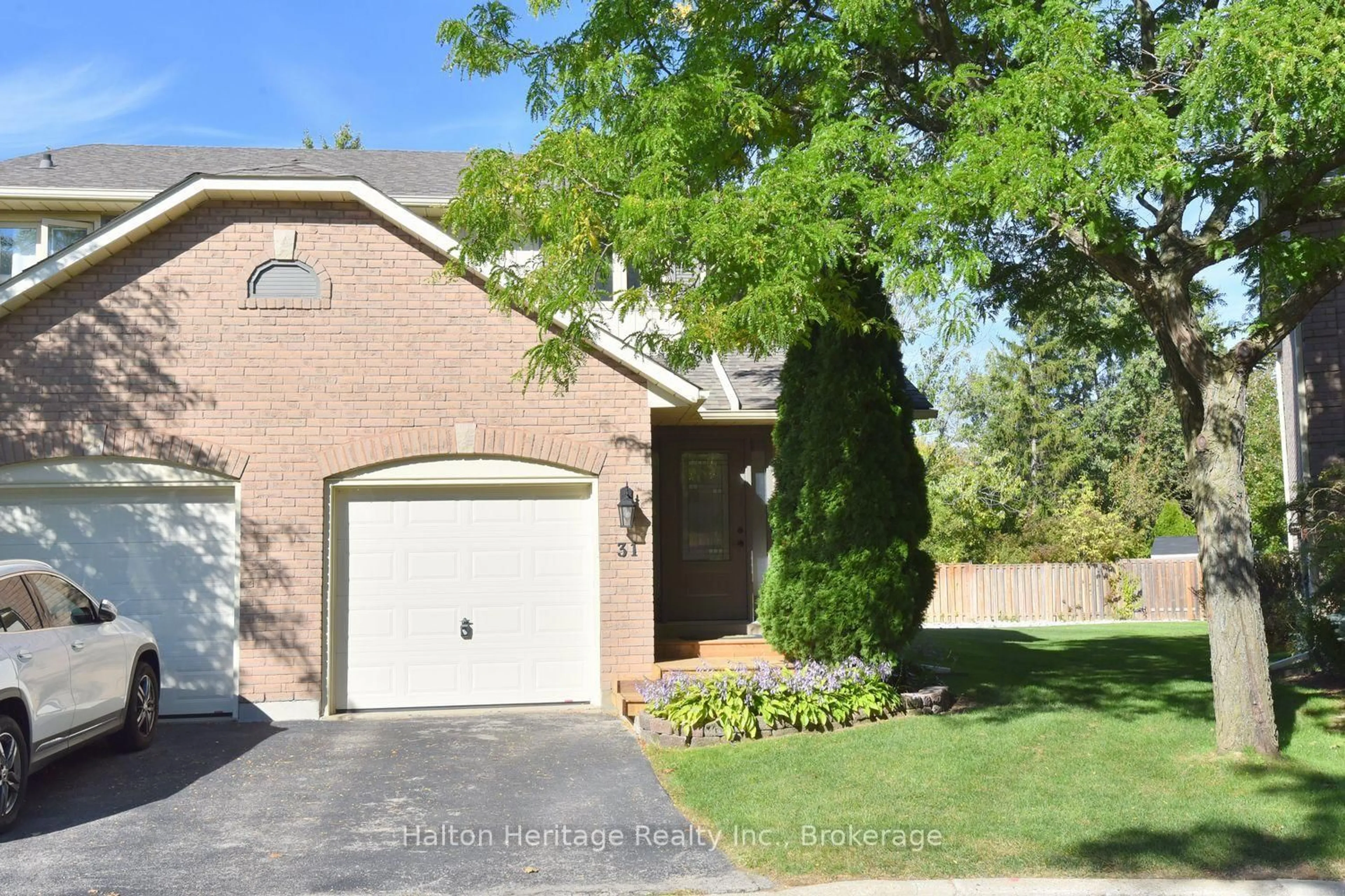 Home with brick exterior material, street for 2470 Headon Forest Dr #31, Burlington Ontario L7M 3X3