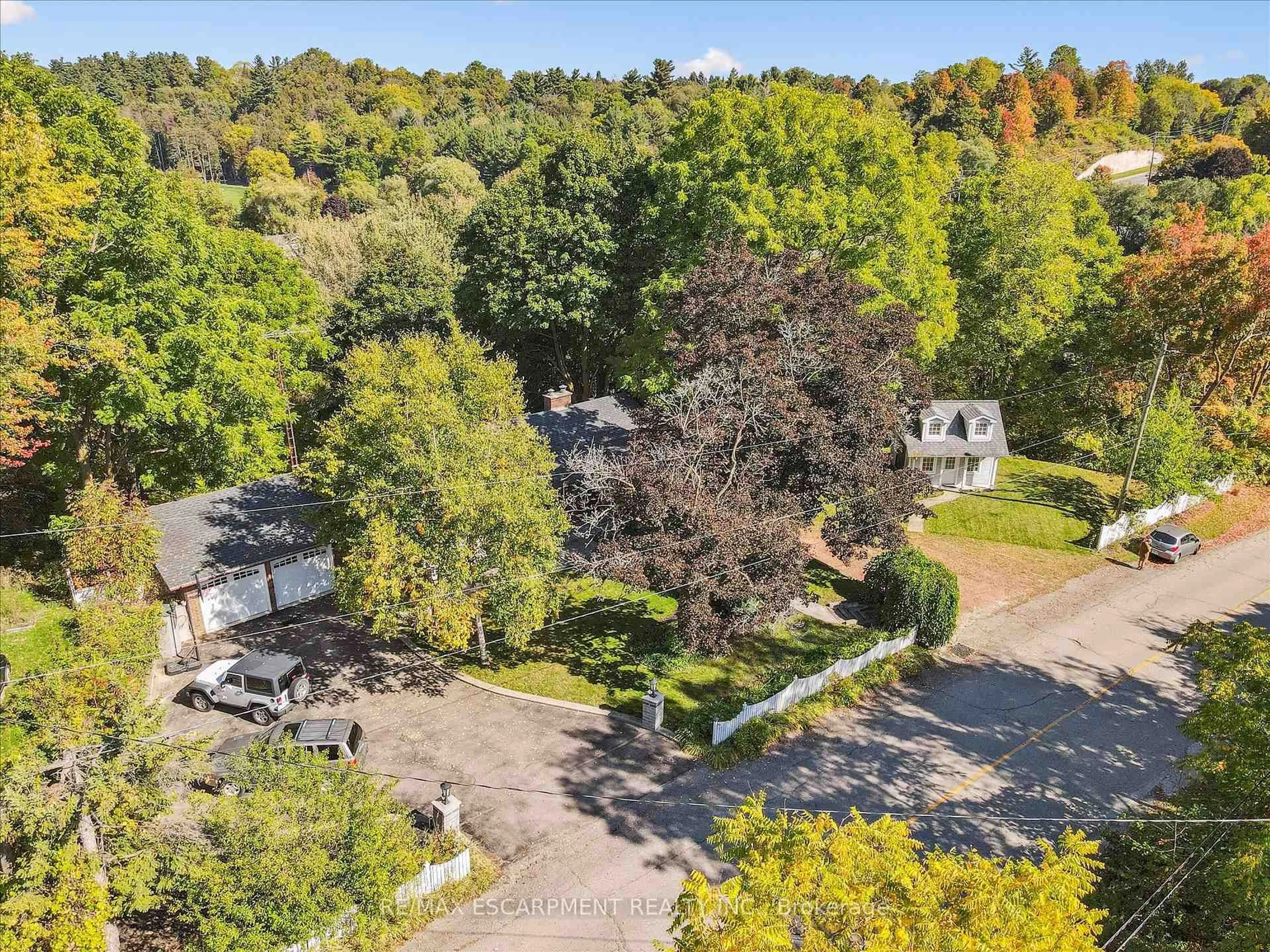 A pic from outside/outdoor area/front of a property/back of a property/a pic from drone, forest/trees view for 19 Stewarttown Rd, Halton Hills Ontario L7G 4S5