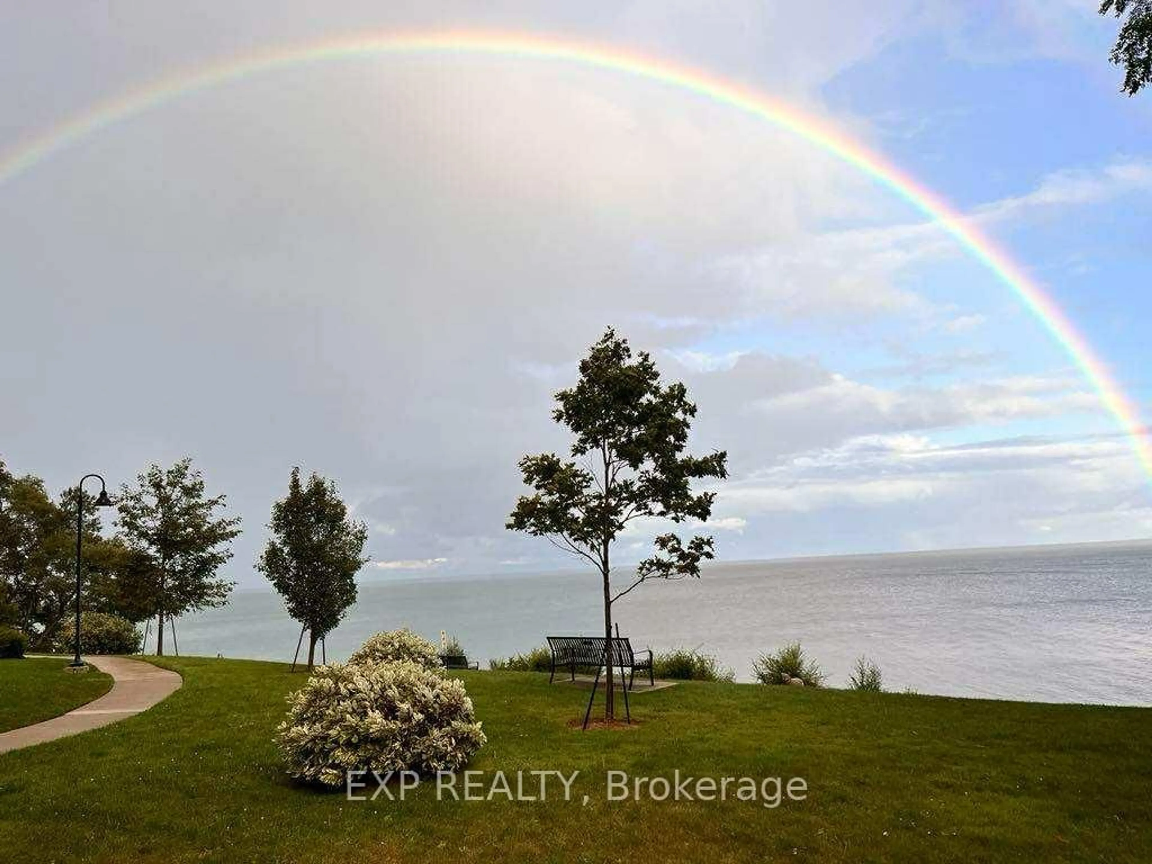 A pic from outside/outdoor area/front of a property/back of a property/a pic from drone, water/lake/river/ocean view for 5250 Lakeshore Rd #104, Burlington Ontario L7L 5L2