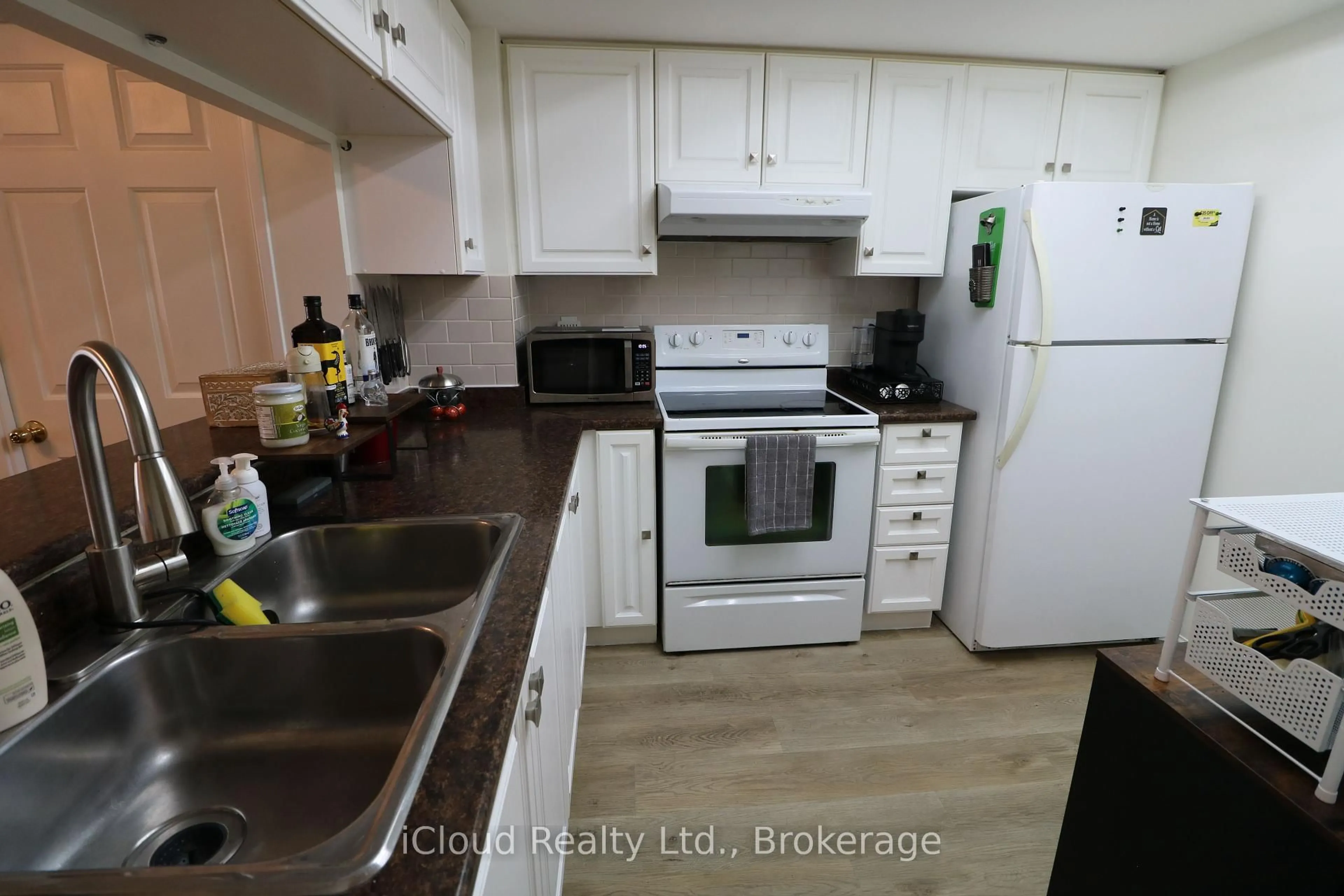 Standard kitchen, unknown for 101 Subway Cres #1502, Toronto Ontario M9B 6K4