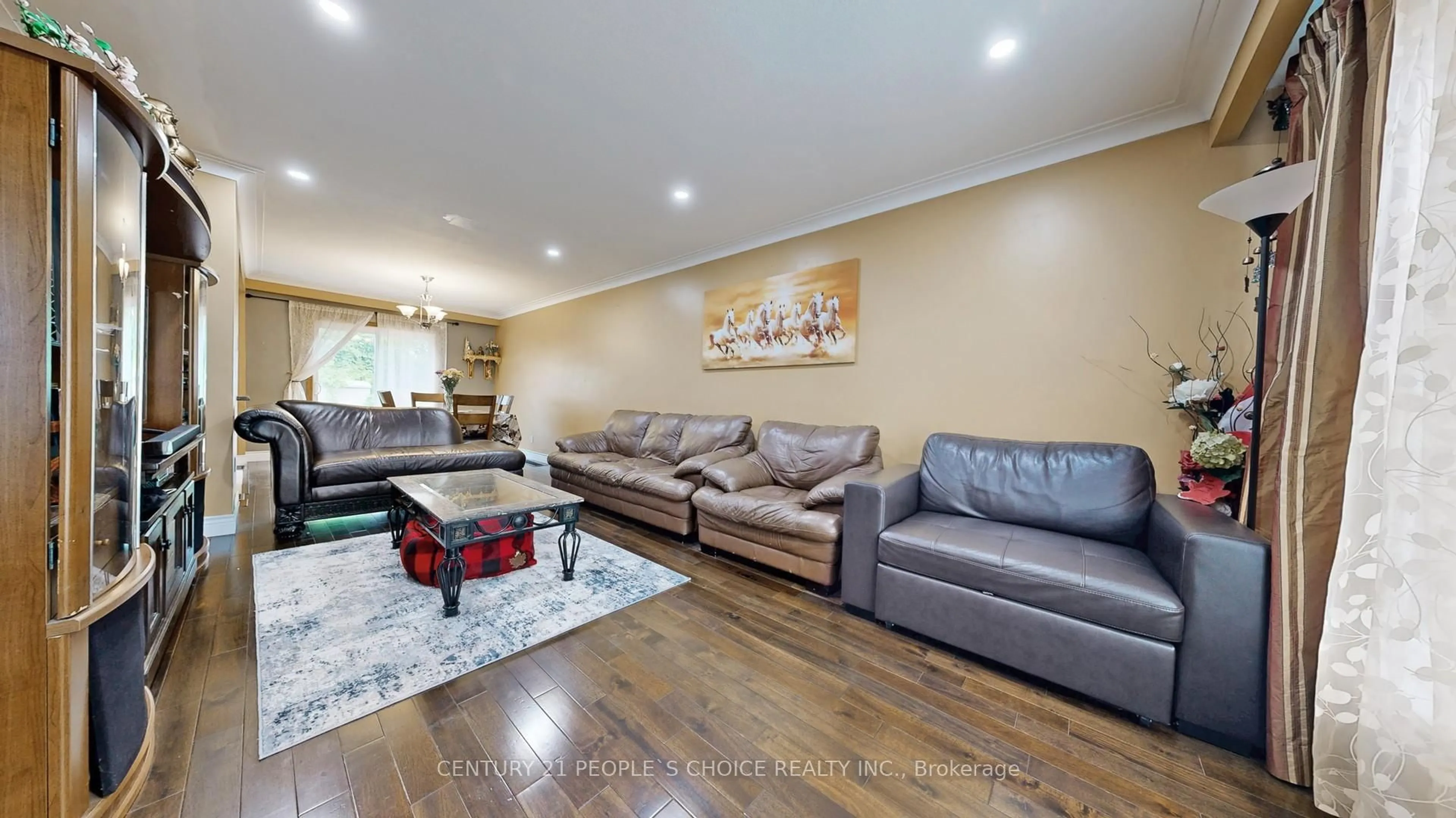 Living room with furniture, wood/laminate floor for 37 Foxrun Ave, Toronto Ontario M3L 1L9
