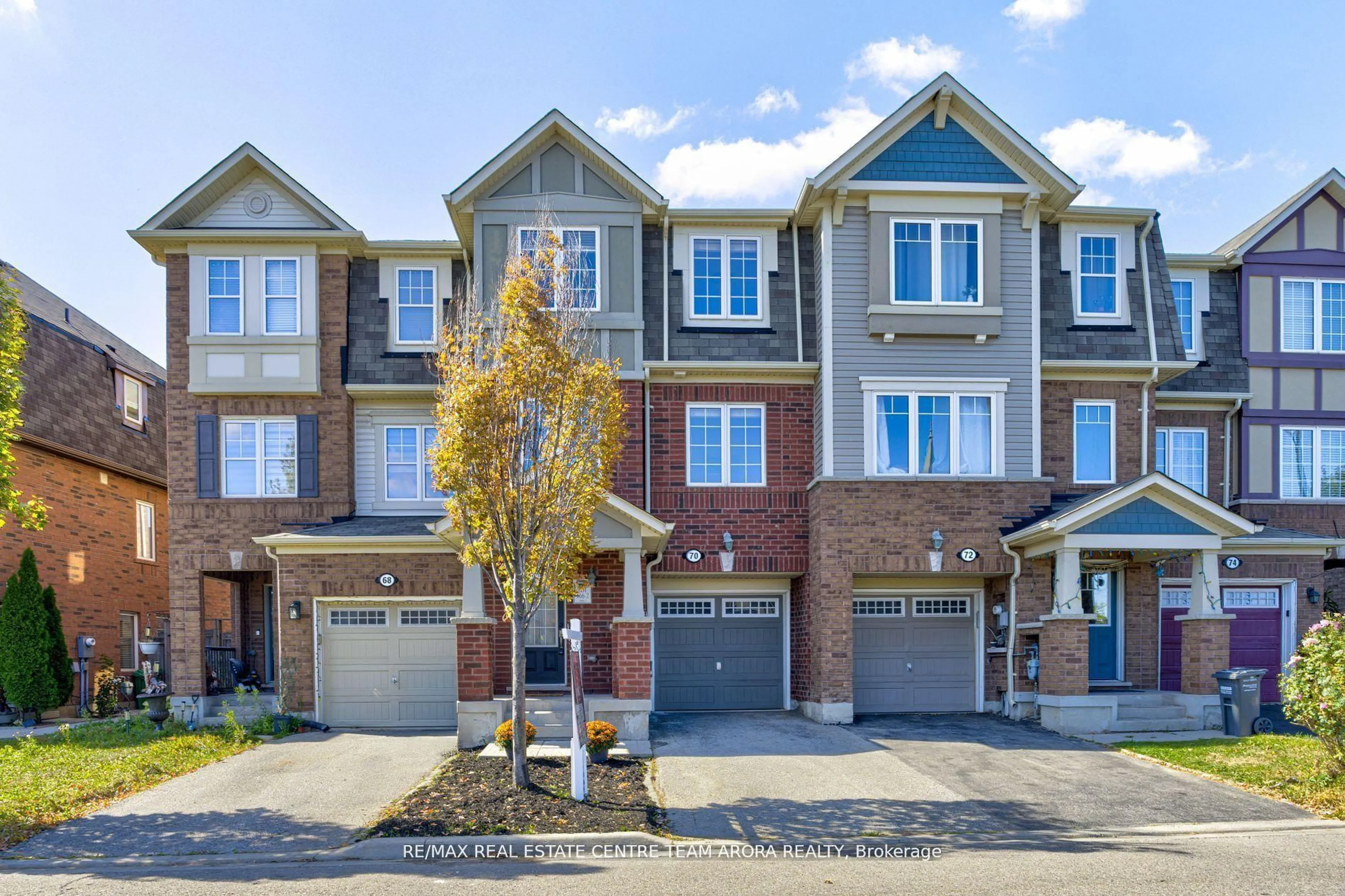 Home with brick exterior material, street for 70 Memory Lane, Brampton Ontario L7A 0W5