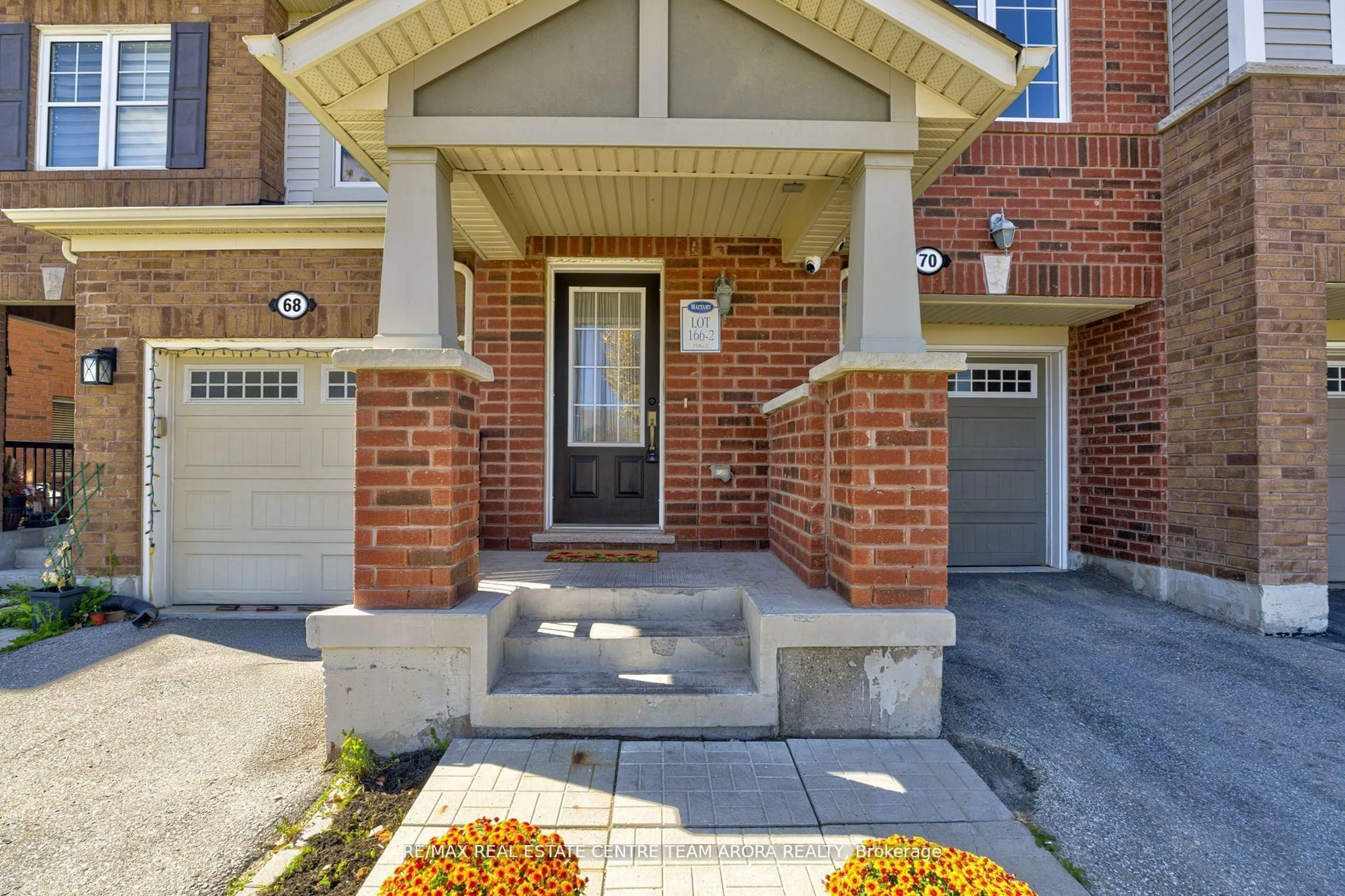 Home with brick exterior material, street for 70 Memory Lane, Brampton Ontario L7A 0W5