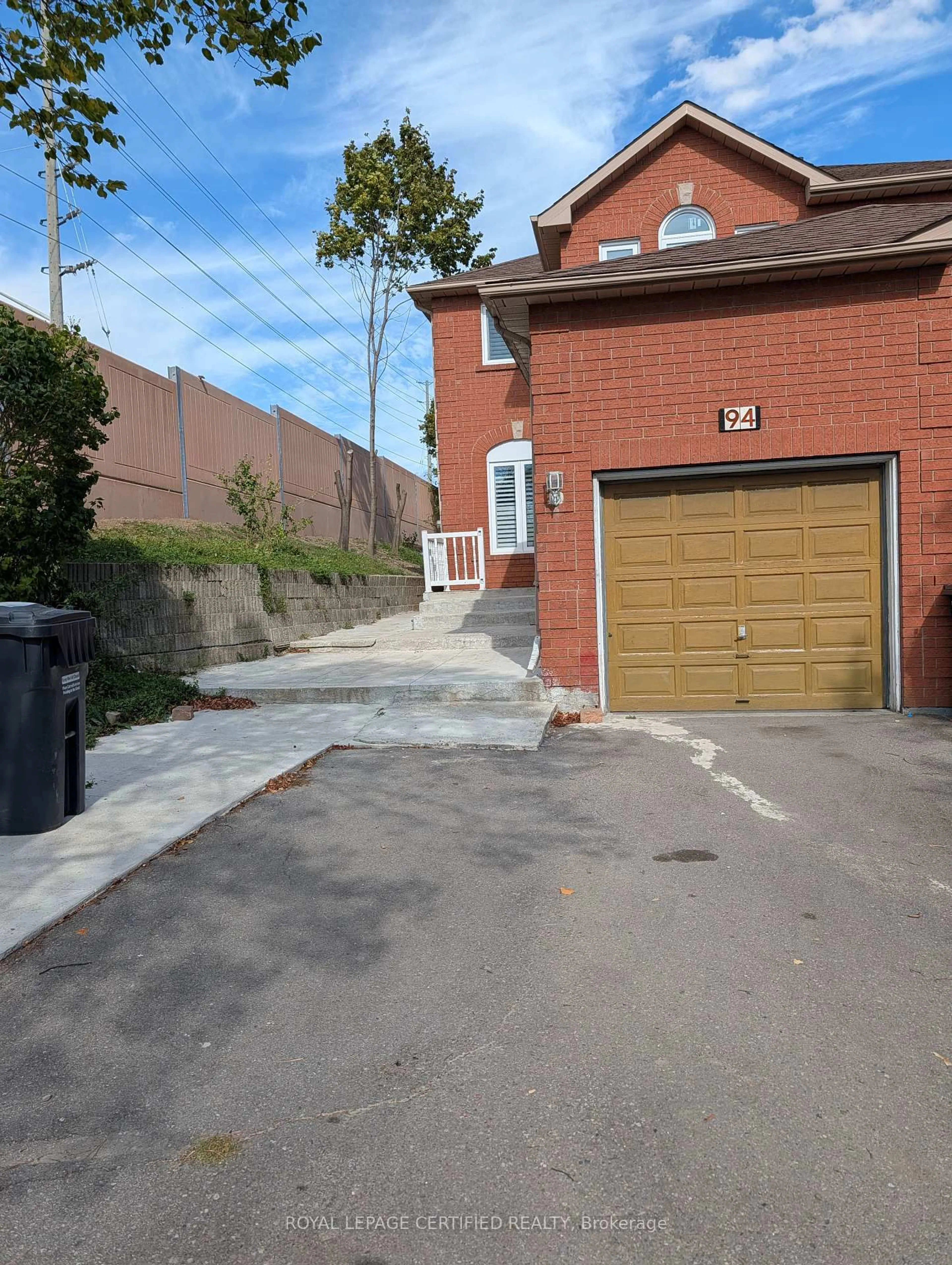 Home with brick exterior material, street for 94 Millstone Dr, Brampton Ontario L6Y 4P9
