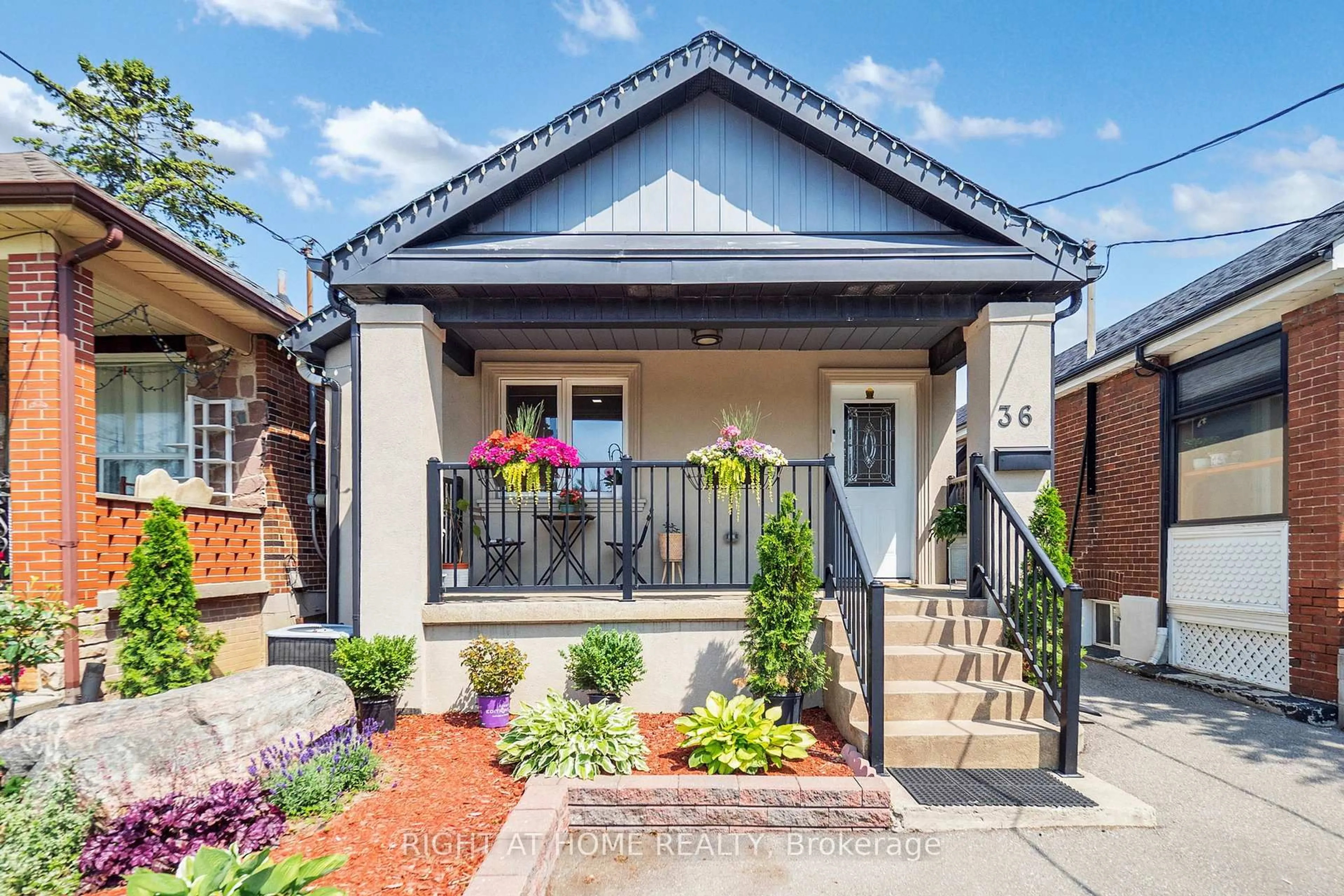 Home with brick exterior material, street for 36 Juliet Cres, Toronto Ontario M6M 1N4
