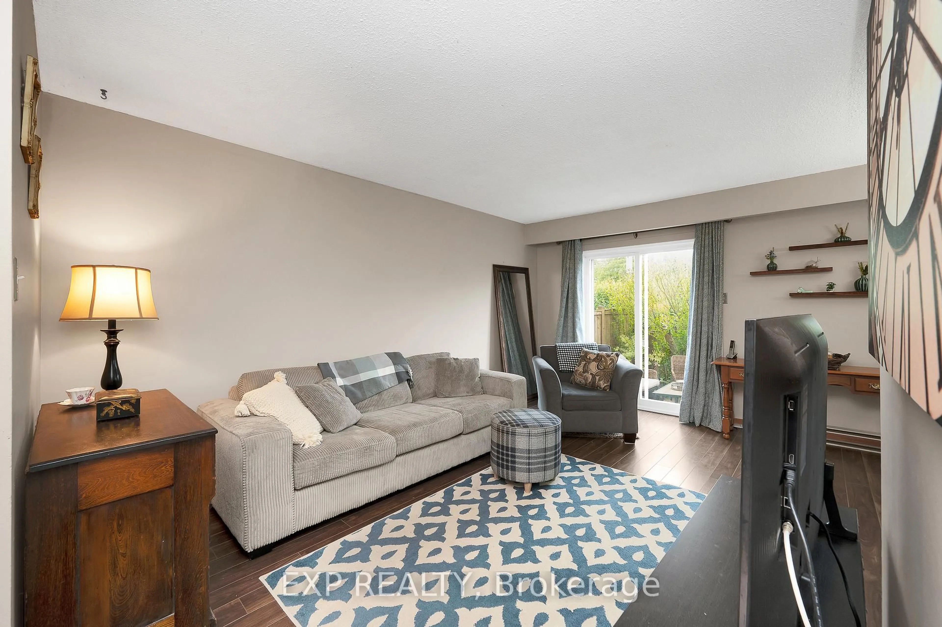 Living room with furniture, unknown for 5017 Pinedale Ave #21, Burlington Ontario L7L 5J6