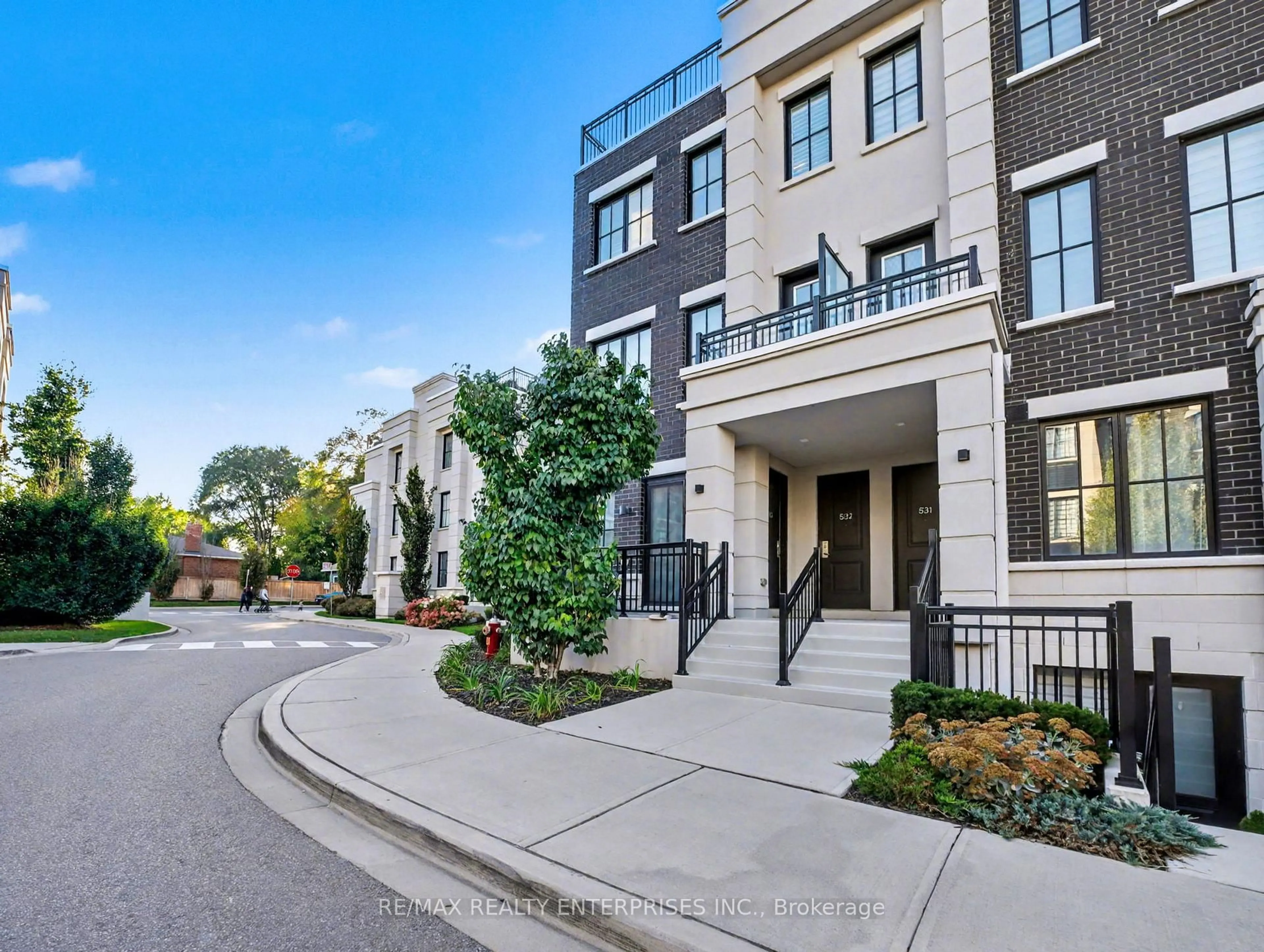 Home with brick exterior material, street for 657 Cricklewood Dr #532, Mississauga Ontario L5G 0B8