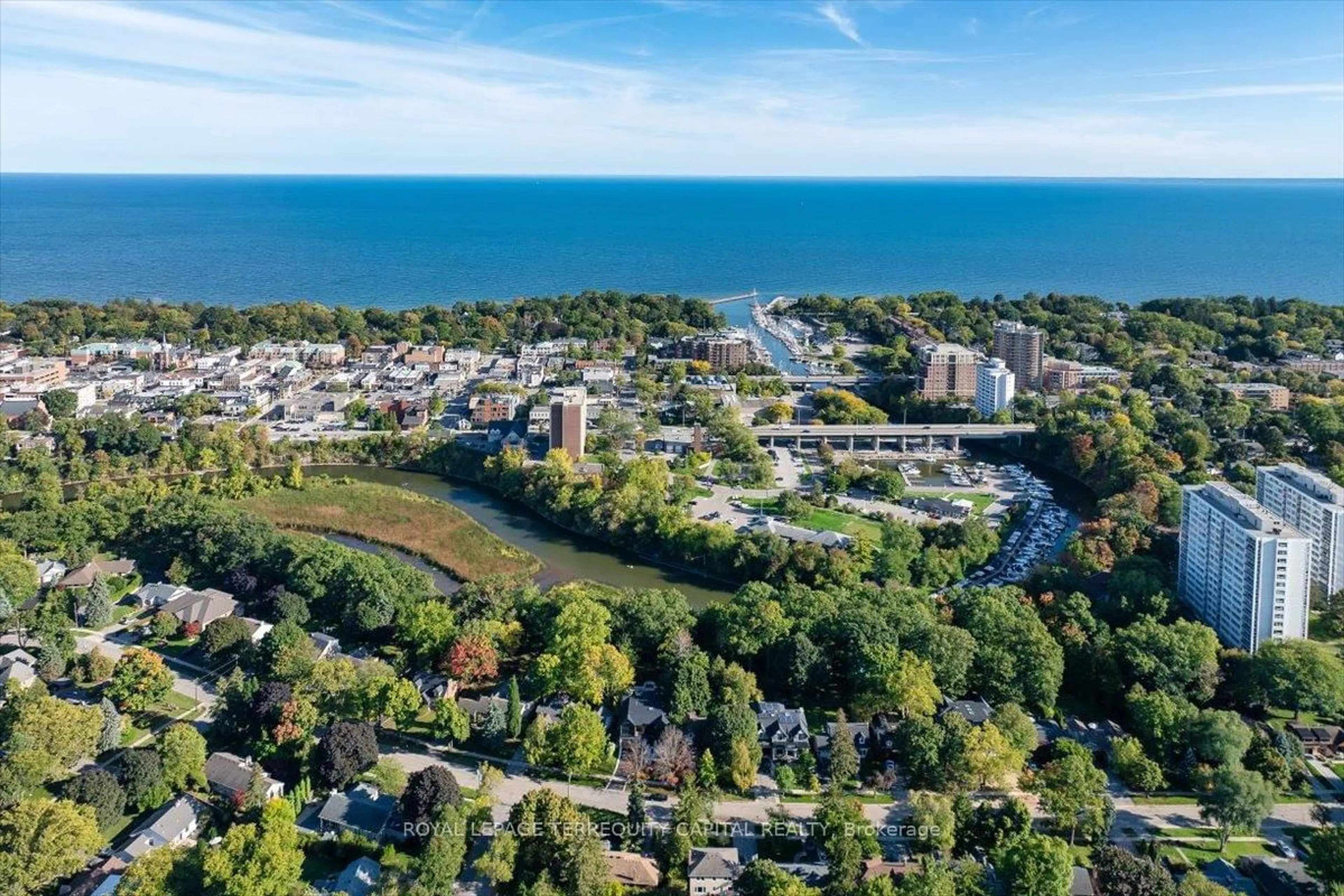A pic from outside/outdoor area/front of a property/back of a property/a pic from drone, water/lake/river/ocean view for 65 Glenmanor Dr, Oakville Ontario L6K 2B3