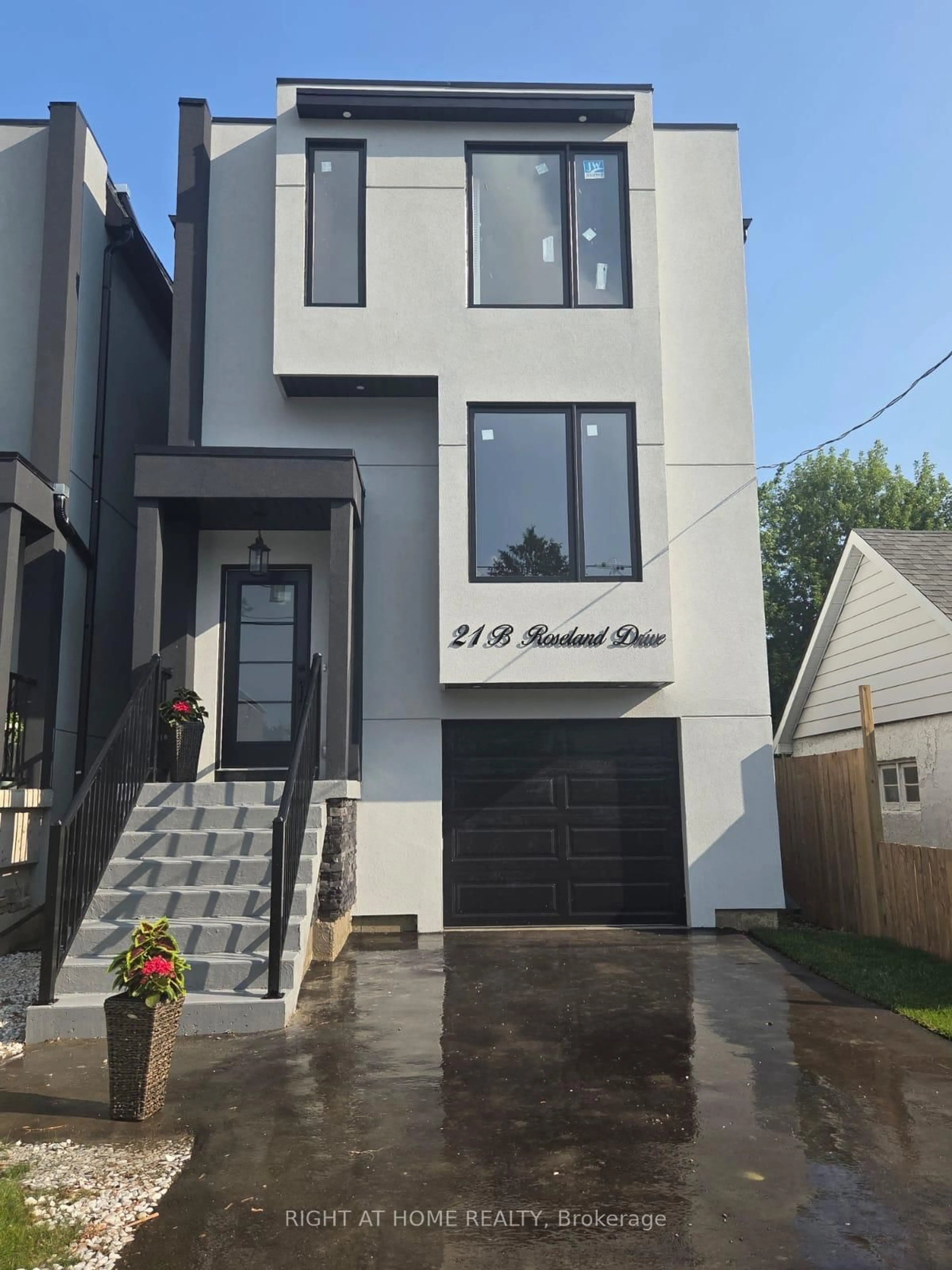 Home with brick exterior material, street for 21B Roseland Dr, Toronto Ontario M8W 1Y3