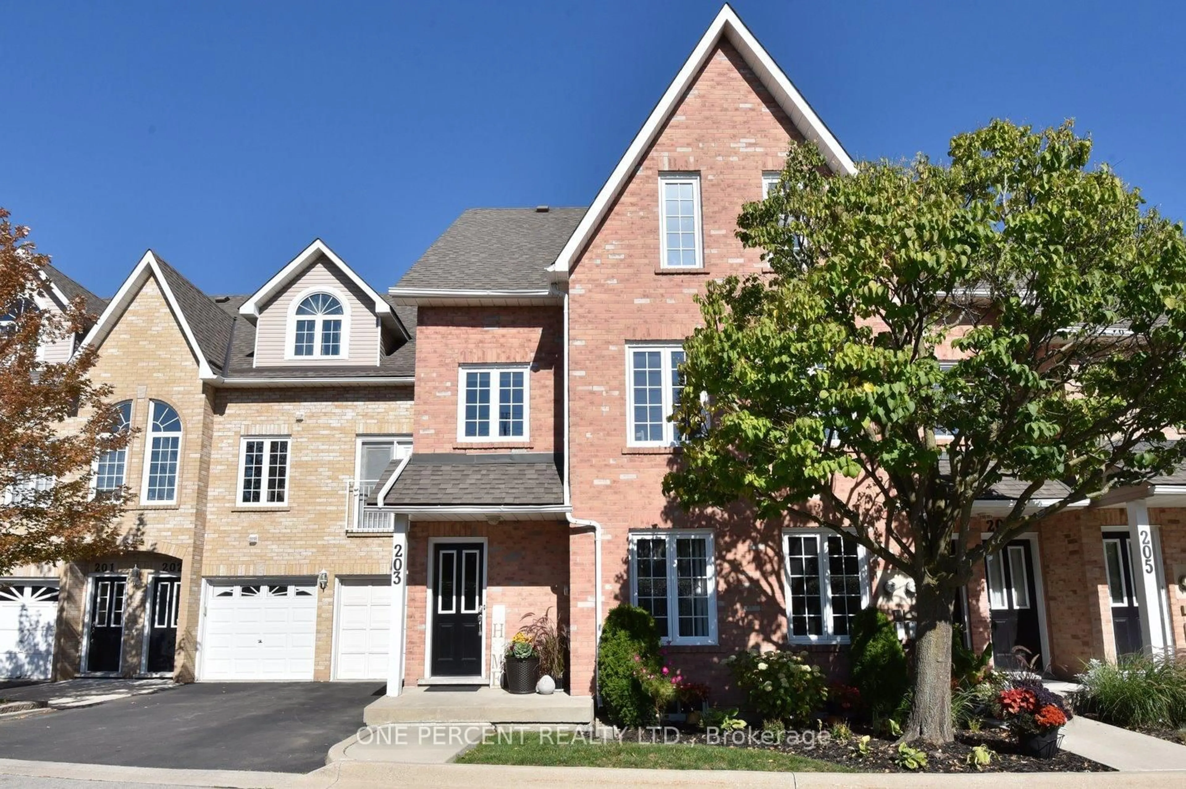 Home with brick exterior material, street for 2075 Walkers Line #203, Burlington Ontario L7M 4G7
