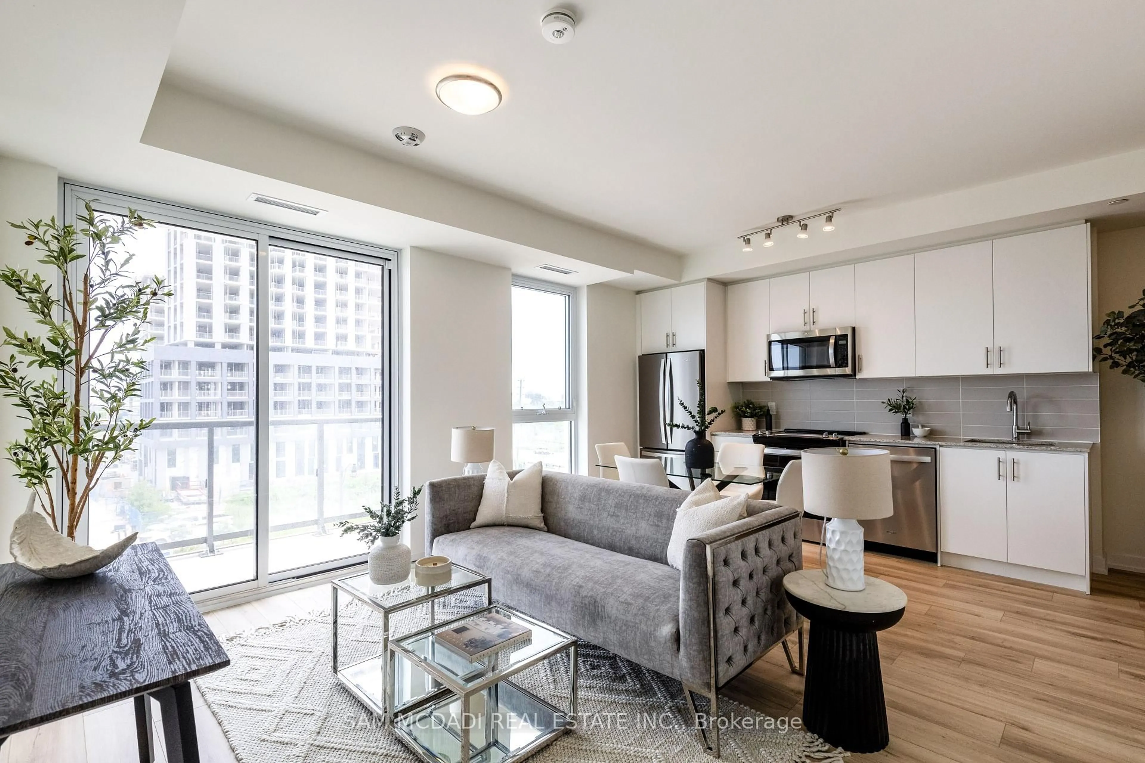 Living room with furniture, unknown for 335 Wheat Boom Dr #405, Oakville Ontario L6H 7Y1