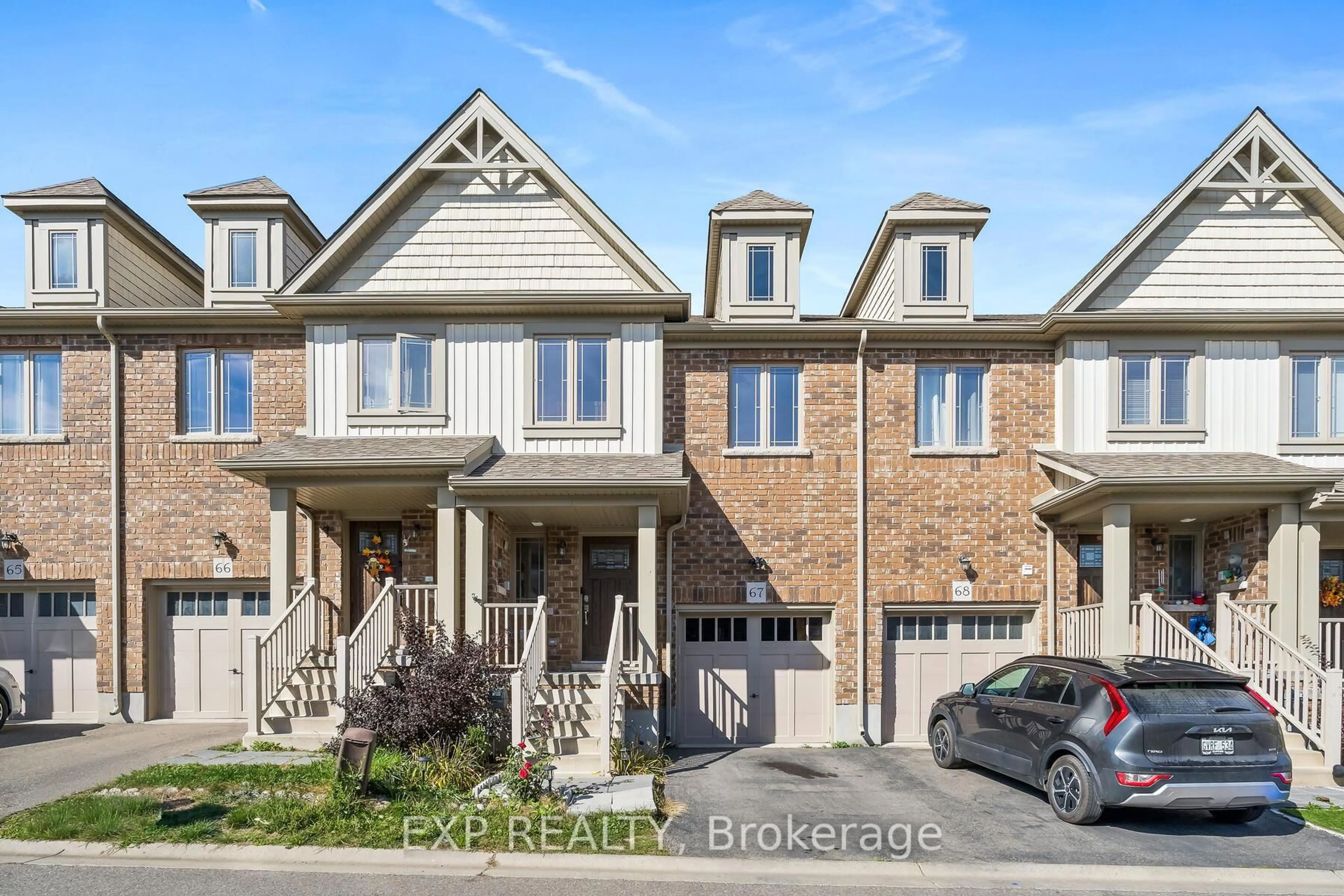 Home with brick exterior material, street for 124 Parkinson Cres #67, Orangeville Ontario L9W 6R7